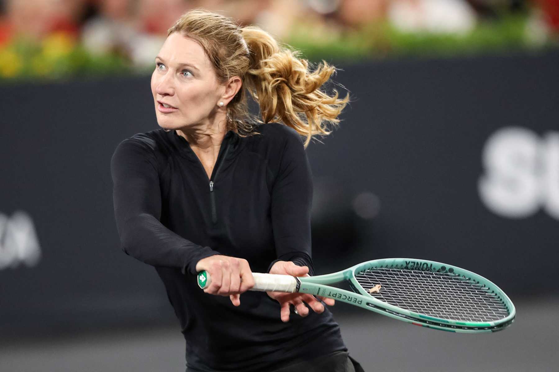 German former tennis player Steffi Graf eyes the ball during an exhibition tennis match at the 5th edition of the Sports Festival organized at the BT Arena in Cluj Napoca, Romania on June 15, 2024. (Photo by Simion Sebastian TATARU / AFP) (Photo by SIMION SEBASTIAN TATARU/AFP via Getty Images)