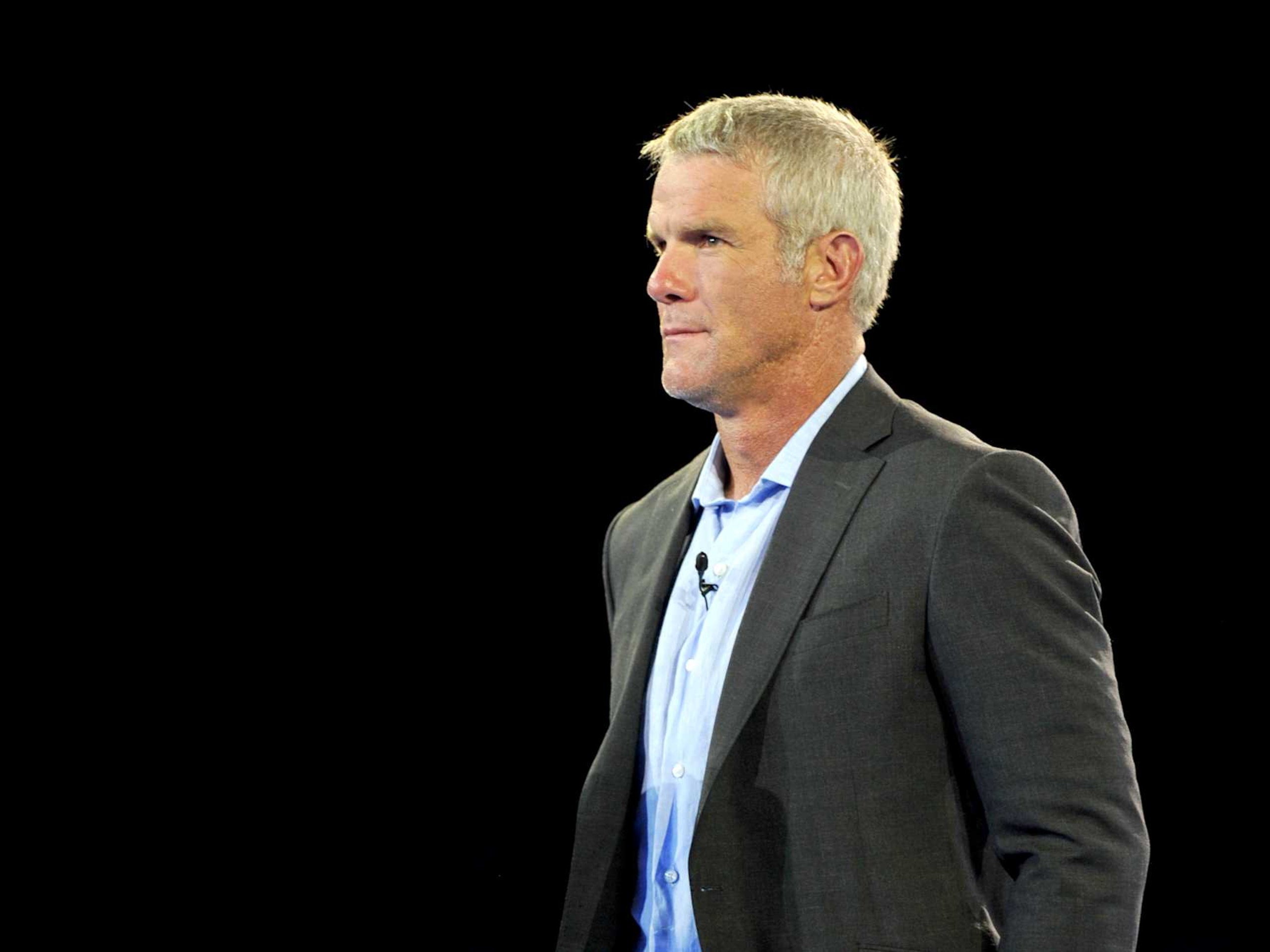 CANTON, OH - AUGUST 4, 2016: 2016 Hall of Fame enshrinee, quarterback Brett Favre is greeted by the crowd during the Pro Football Hall of Fame Gold Jacket Dinner on August 4, 2016 at the Canton Memorial Civic Center in Canton, Ohio. (Photo by Nick Cammett/Diamond Images/Getty Images)  