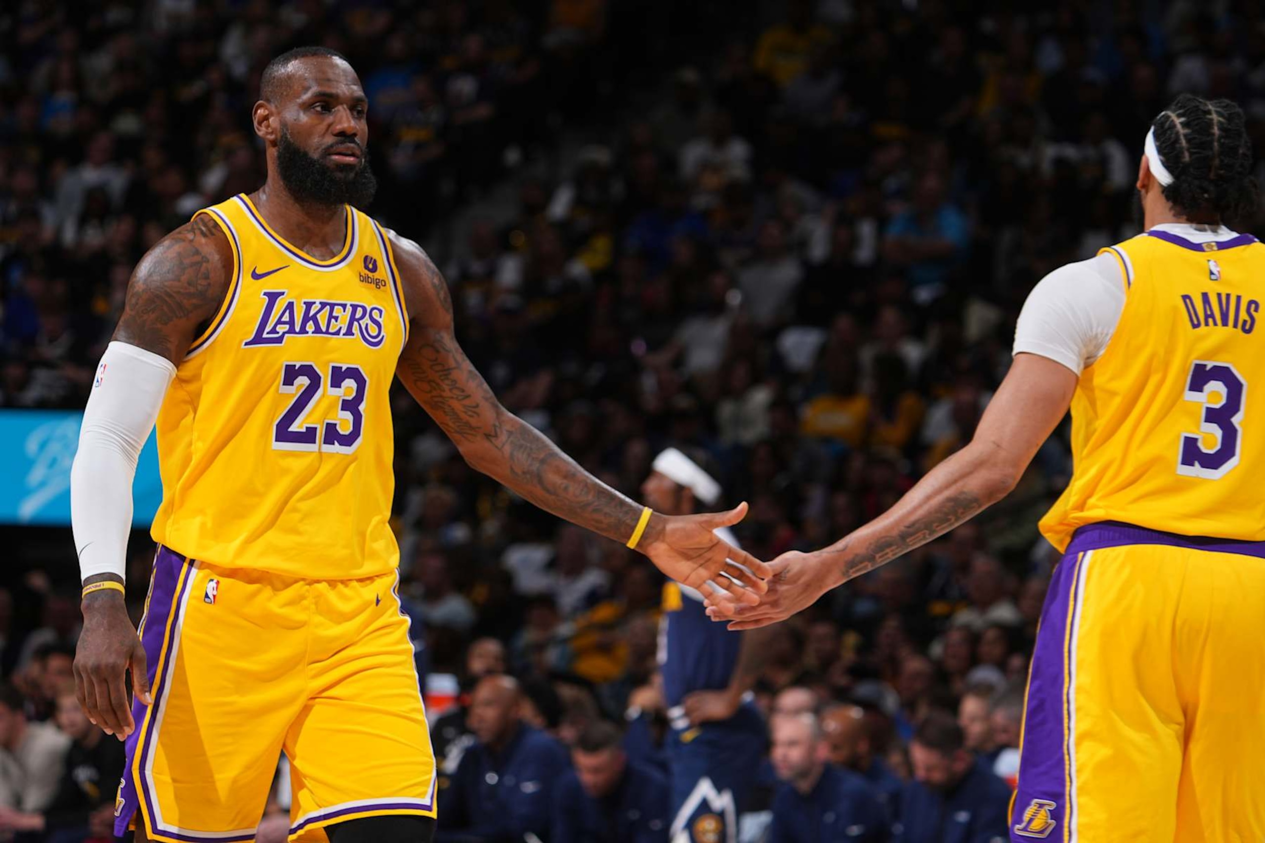 DENVER, CO - APRIL 29: LeBron James #23 of the Los Angeles Lakers and Anthony Davis #3 of the Los Angeles Lakers high five during the game against the Denver Nuggets during Round One Game Five of the 2024 NBA Playoffs on April 29, 2024 at the Ball Arena in Denver, Colorado. NOTE TO USER: User expressly acknowledges and agrees that, by downloading and/or using this Photograph, user is consenting to the terms and conditions of the Getty Images License Agreement. Mandatory Copyright Notice: Copyright 2024 NBAE (Photo by Bart Young/NBAE via Getty Images) DENVER, CO - APRIL 29: LeBron James #23 of the Los Angeles Lakers and Anthony Davis #3 of the Los Angeles Lakers high five during the game against the Denver Nuggets during Round One Game Five of the 2024 NBA Playoffs on April 29, 2024 at the Ball Arena in Denver, Colorado. NOTE TO USER: User expressly acknowledges and agrees that, by downloading and/or using this Photograph, user is consenting to the terms and conditions of the Getty Images License Agreement. Mandatory Copyright Notice: Copyright 2024 NBAE (Photo by Bart Young/NBAE via Getty Images)