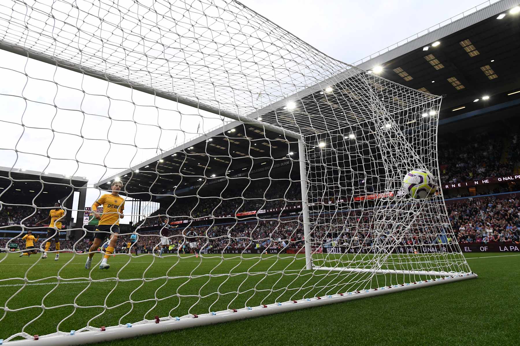 Wolverhampton concedes the 1-1 equalising goal   during the English Premier League football match between Aston Villa and Wolverhampton Wanderers at Villa Park in Birmingham, central England on September 21, 2024. (Photo by JUSTIN TALLIS / AFP) / RESTRICTED TO EDITORIAL USE. No use with unauthorized audio, video, data, fixture lists, club/league logos or 'live' services. Online in-match use limited to 120 images. An additional 40 images may be used in extra time. No video emulation. Social media in-match use limited to 120 images. An additional 40 images may be used in extra time. No use in betting publications, games or single club/league/player publications. /  (Photo by JUSTIN TALLIS/AFP via Getty Images)