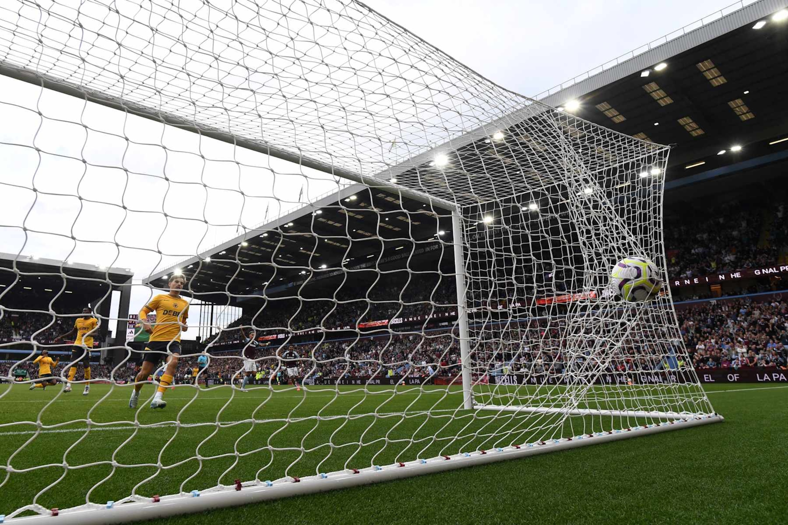 Wolverhampton concedes the 1-1 equalising goal   during the English Premier League football match between Aston Villa and Wolverhampton Wanderers at Villa Park in Birmingham, central England on September 21, 2024. (Photo by JUSTIN TALLIS / AFP) / RESTRICTED TO EDITORIAL USE. No use with unauthorized audio, video, data, fixture lists, club/league logos or 'live' services. Online in-match use limited to 120 images. An additional 40 images may be used in extra time. No video emulation. Social media in-match use limited to 120 images. An additional 40 images may be used in extra time. No use in betting publications, games or single club/league/player publications. /  (Photo by JUSTIN TALLIS/AFP via Getty Images)