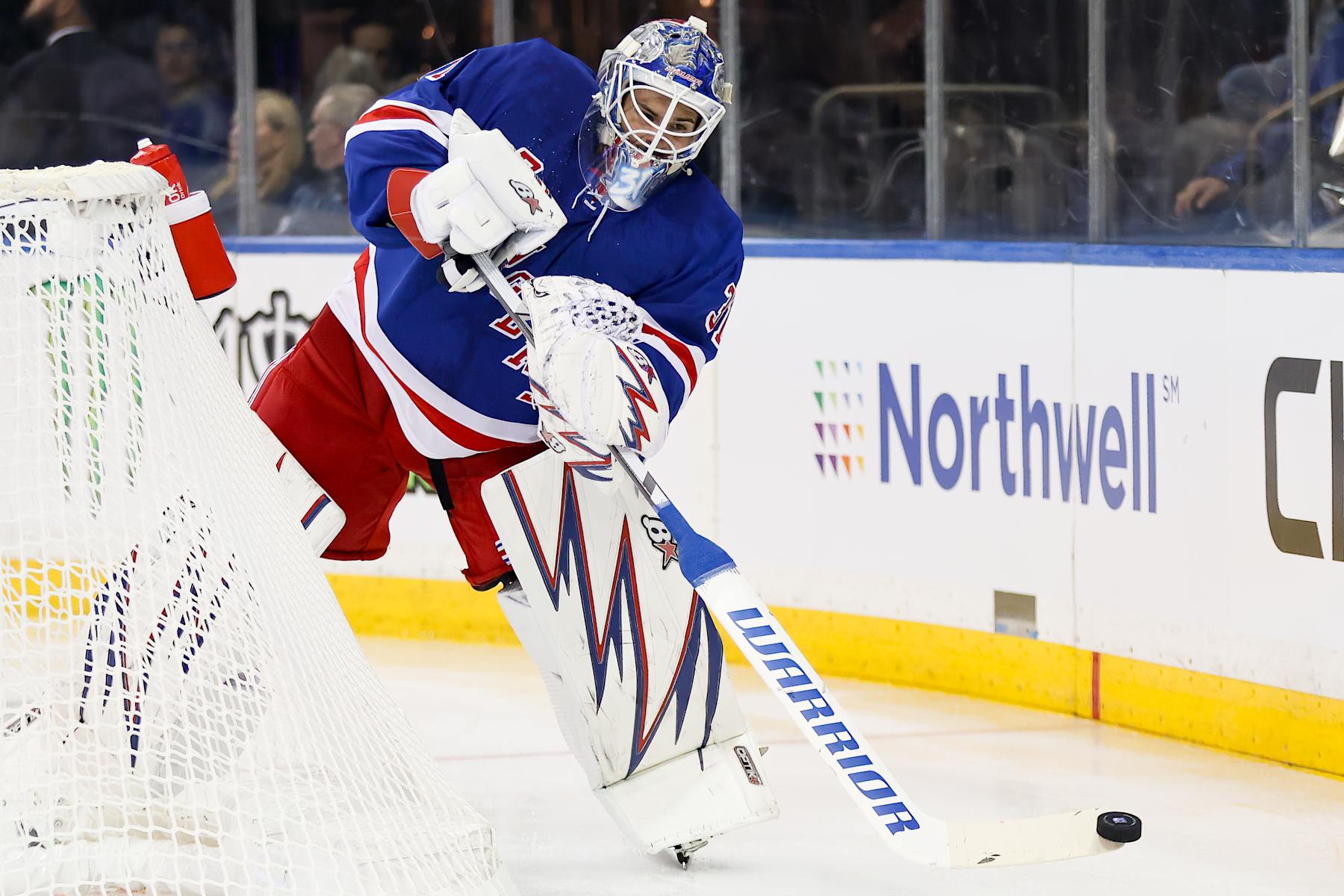 NEW YORK, NY - SEPTEMBER 24: New York Rangers Goalie Igor Shesterkin (31) clears the puck behind the net during the first period of the National Hockey League preseason game between the New York Islanders and the New York Rangers on September 24, 2024 at Madison Square Garden in New York, NY. (Photo by Joshua Sarner/Icon Sportswire via Getty Images)