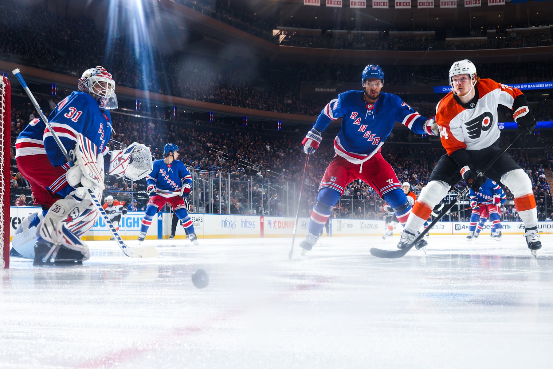 NEW YORK, NEW YORK - MARCH 26:  Igor Shesterkin #31 of the New York Rangers tends the net as K'Andre Miller #79 defends against Owen Tippett #74 of the Philadelphia Flyers at Madison Square Garden on March 26, 2024 in New York City. (Photo by Jared Silber/NHLI via Getty Images)