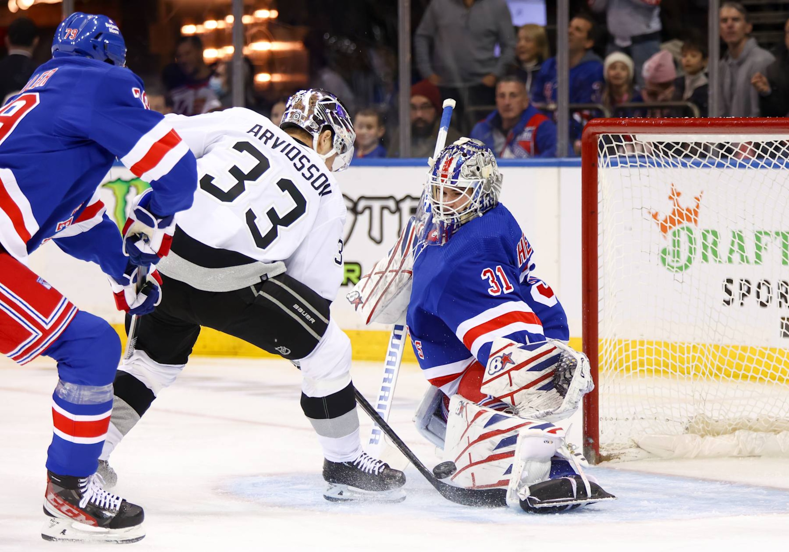 NEW YORK, NY - FEBRUARY 26: New York Rangers Goalie Igor Shesterkin (31) deflects a shot by Los Angeles Kings Right Wing Viktor Arvidsson (33) during the National Hockey League game between the Los Angeles Kings and the New York Rangers on February 26, 2023 at Madison Square Garden in New York, NY. (Photo by Joshua Sarner/Icon Sportswire via Getty Images)