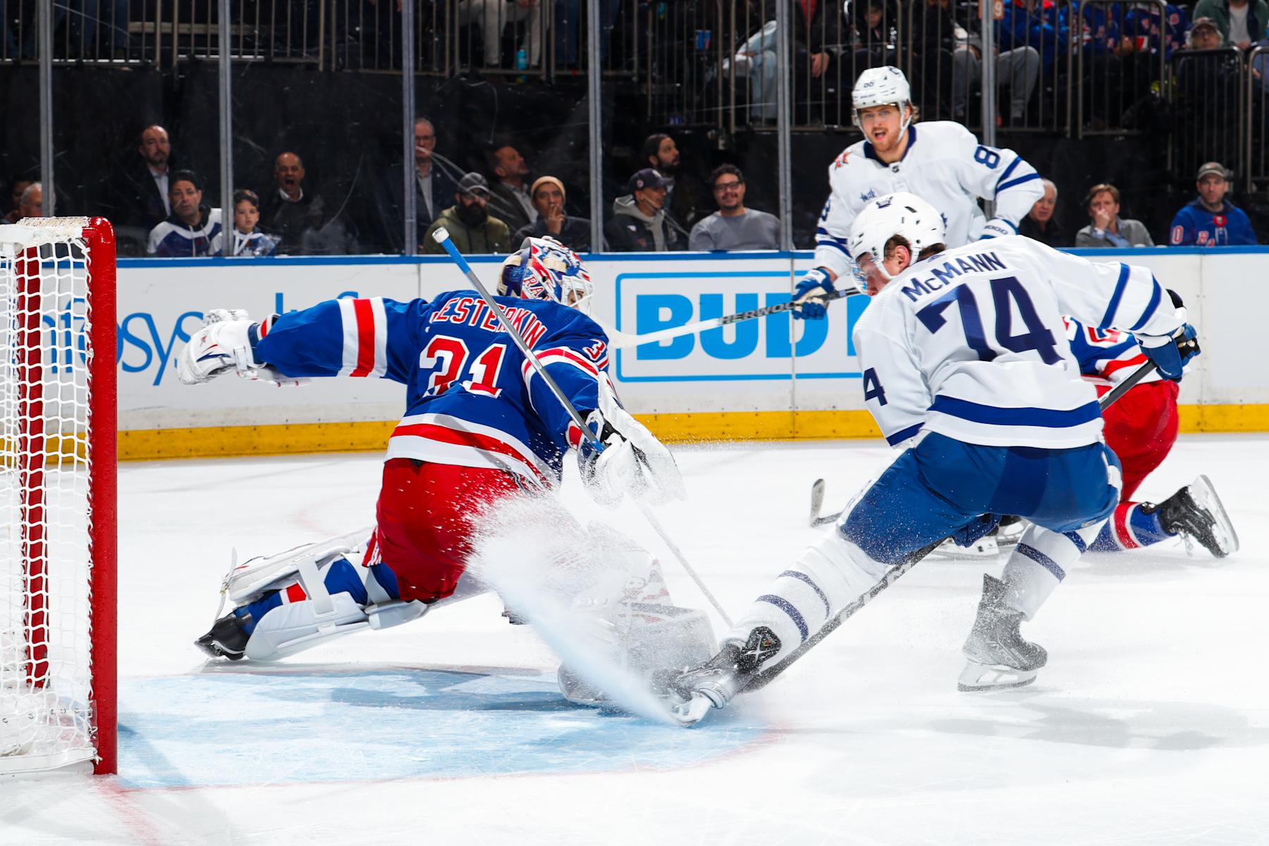 NEW YORK, NEW YORK - DECEMBER 12:  Igor Shesterkin #31 of the New York Rangers makes a save against Bobby McMann #74 of the Toronto Maple Leafs at Madison Square Garden on December 12, 2023 in New York City. (Photo by Jared Silber/NHLI via Getty Images)