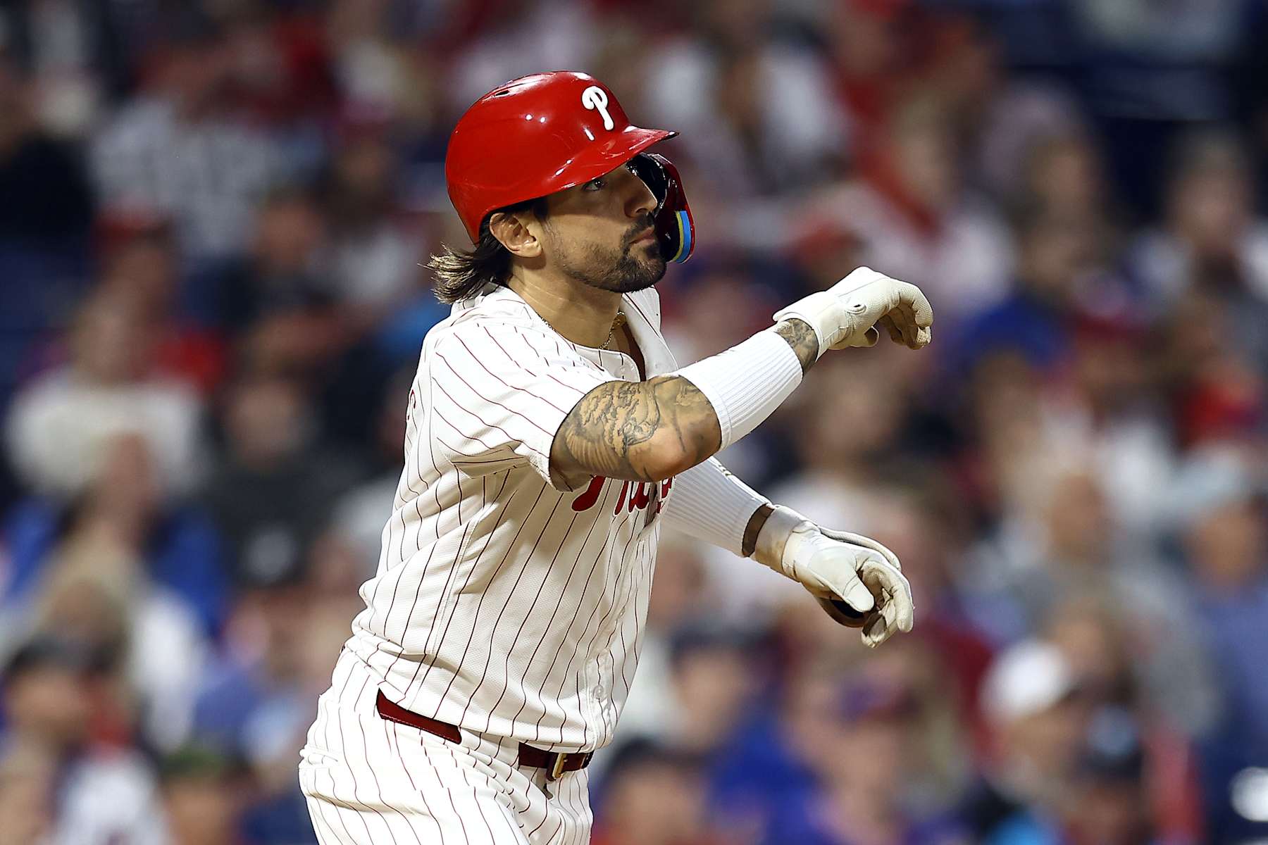 PHILADELPHIA, PENNSYLVANIA - SEPTEMBER 25: Nick Castellanos #8 of the Philadelphia Phillies reacts after hitting a solo home run during the third inning against the Chicago Cubs at Citizens Bank Park on September 25, 2024 in Philadelphia, Pennsylvania. (Photo by Tim Nwachukwu/Getty Images)