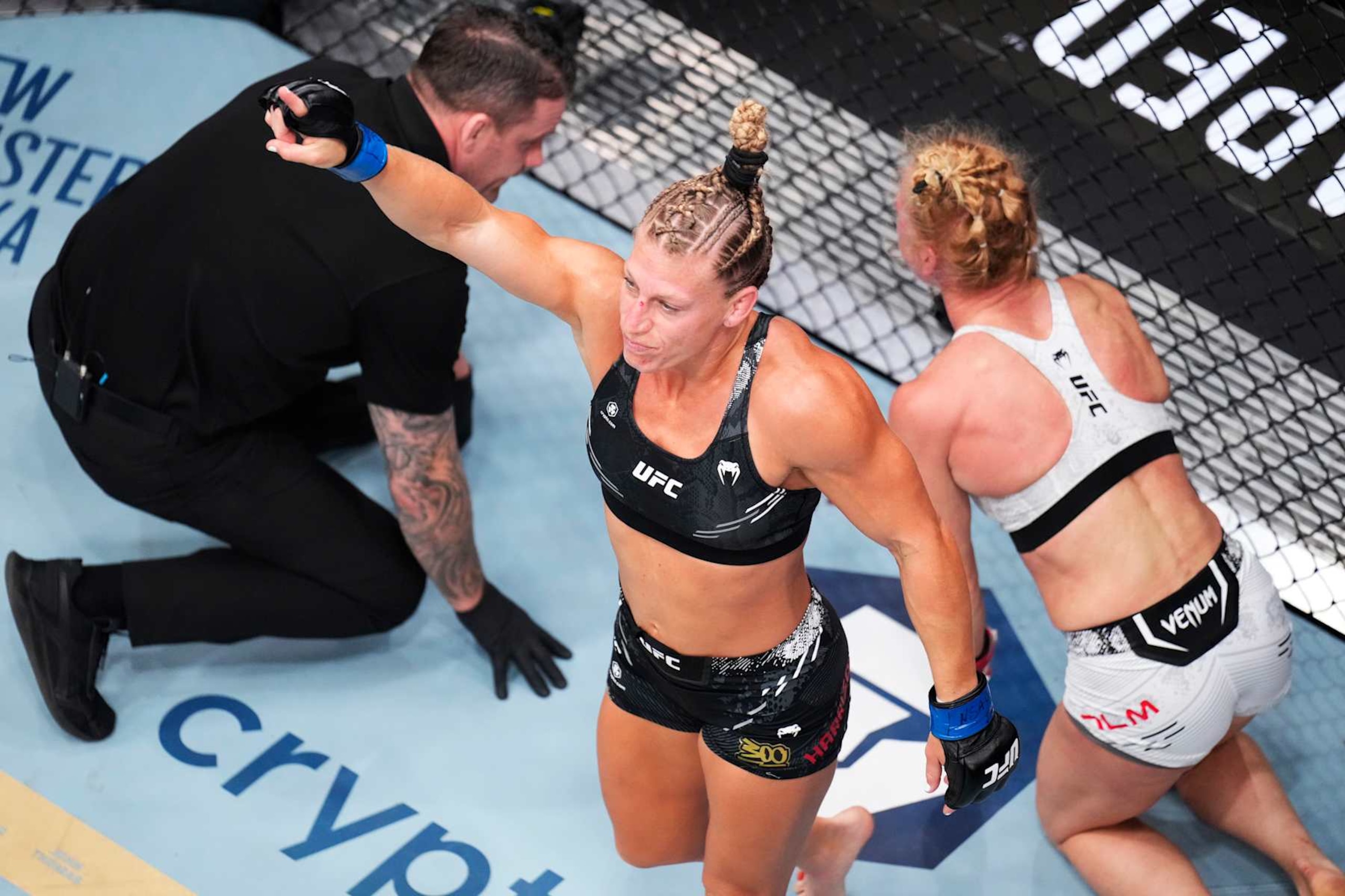 Kayla Harrison reacts after submitting Holly Holm