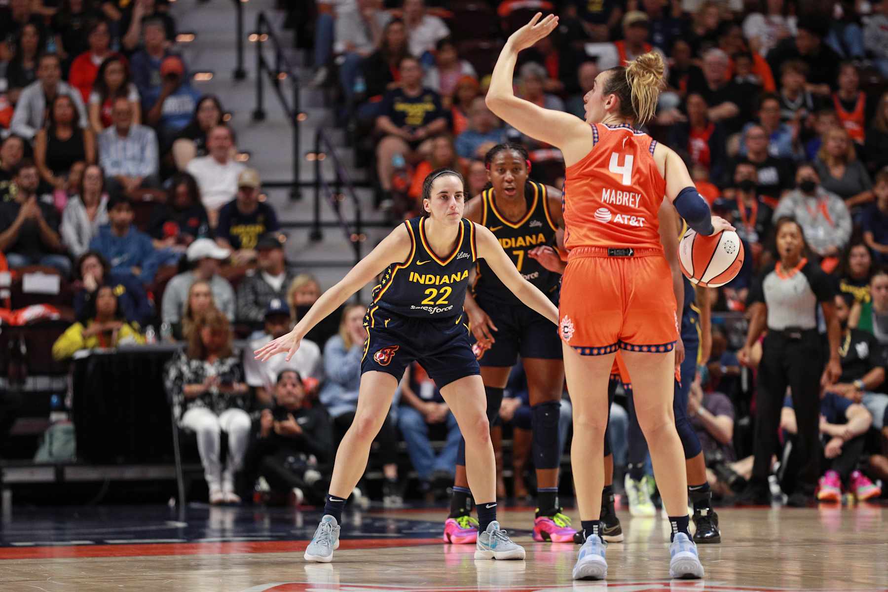 UNCASVILLE, CT - SEPTEMBER 22: Caitlin Clark #22 of the Indiana Fever plays defense during the game against the Connecticut Sun during round one game one of the 2024 WNBA Playoffs on September 22, 2024 at the Mohegan Sun Arena in Uncasville, Connecticut. NOTE TO USER: User expressly acknowledges and agrees that, by downloading and or using this photograph, User is consenting to the terms and conditions of the Getty Images License Agreement. Mandatory Copyright Notice: Copyright 2024 NBAE (Photo by Chris Marion/NBAE via Getty Images)