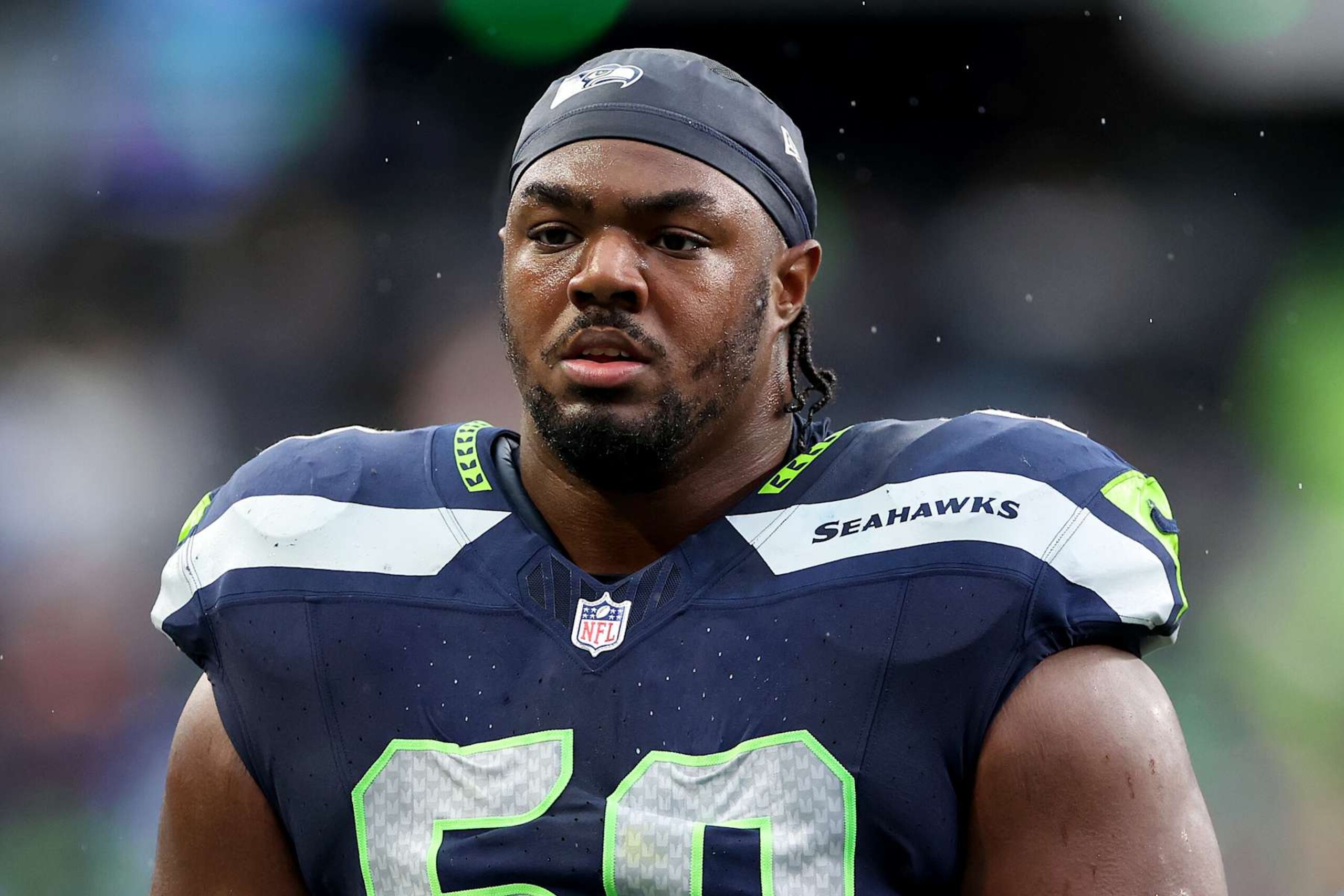 SEATTLE, WASHINGTON - NOVEMBER 12: Phil Haynes #60 of the Seattle Seahawks looks on during the second quarter against the Washington Commanders at Lumen Field on November 12, 2023 in Seattle, Washington. (Photo by Steph Chambers/Getty Images)