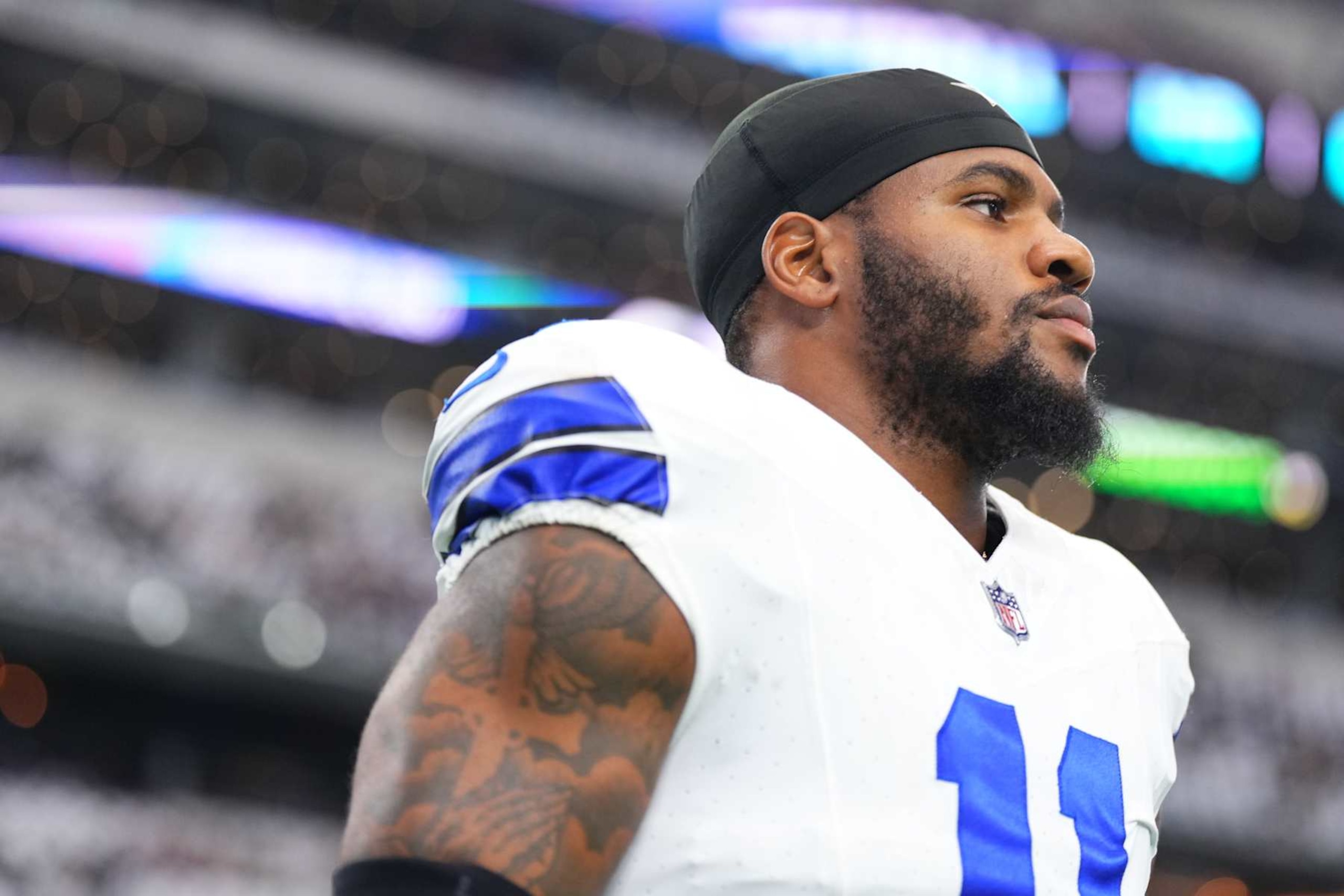 ARLINGTON, TX - SEPTEMBER 22: Micah Parsons #11 of the Dallas Cowboys looks on before kickoff against the Baltimore Ravens during an NFL football game at AT&T Stadium on September 22, 2024 in Arlington, Texas. (Photo by Cooper Neill/Getty Images)