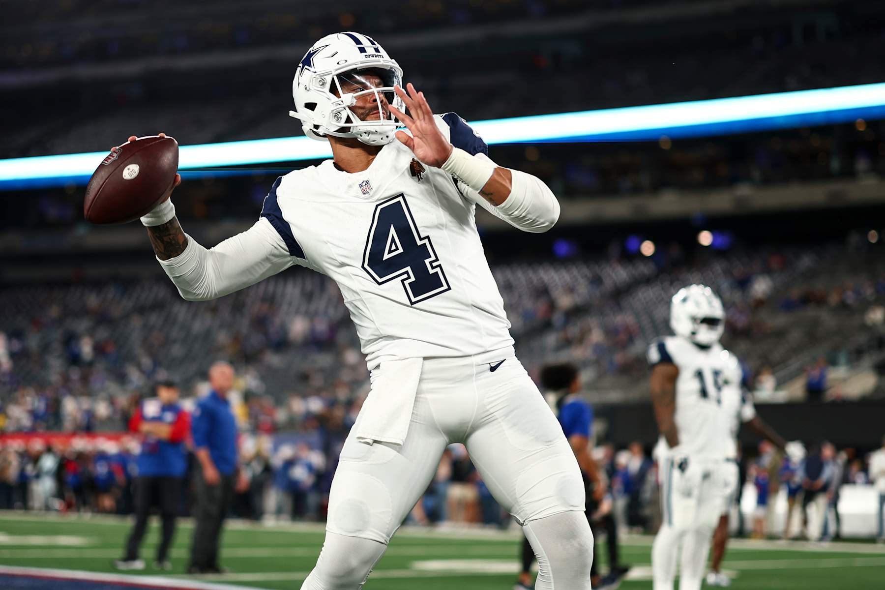 EAST RUTHERFORD, NJ - SEPTEMBER 26: Dak Prescott #4 of the Dallas Cowboys warms up prior to an NFL football game against the New York Giants at MetLife Stadium on September 26, 2024 in East Rutherford, New Jersey. (Photo by Kevin Sabitus/Getty Images)