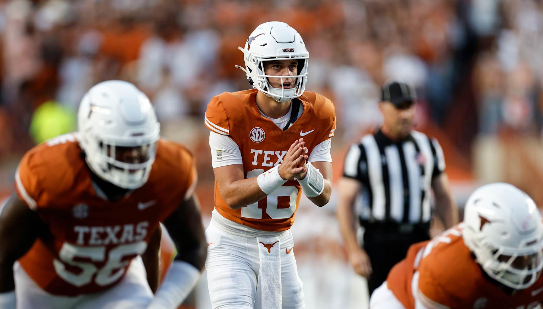 AUSTIN, TEXAS - SEPTEMBER 21: Arch Manning #16 of the Texas Longhorns awaits the sna at the line of scrimmage in the first half against the Louisiana Monroe Warhawks at Darrell K Royal-Texas Memorial Stadium on September 21, 2024 in Austin, Texas. (Photo by Tim Warner/Getty Images)