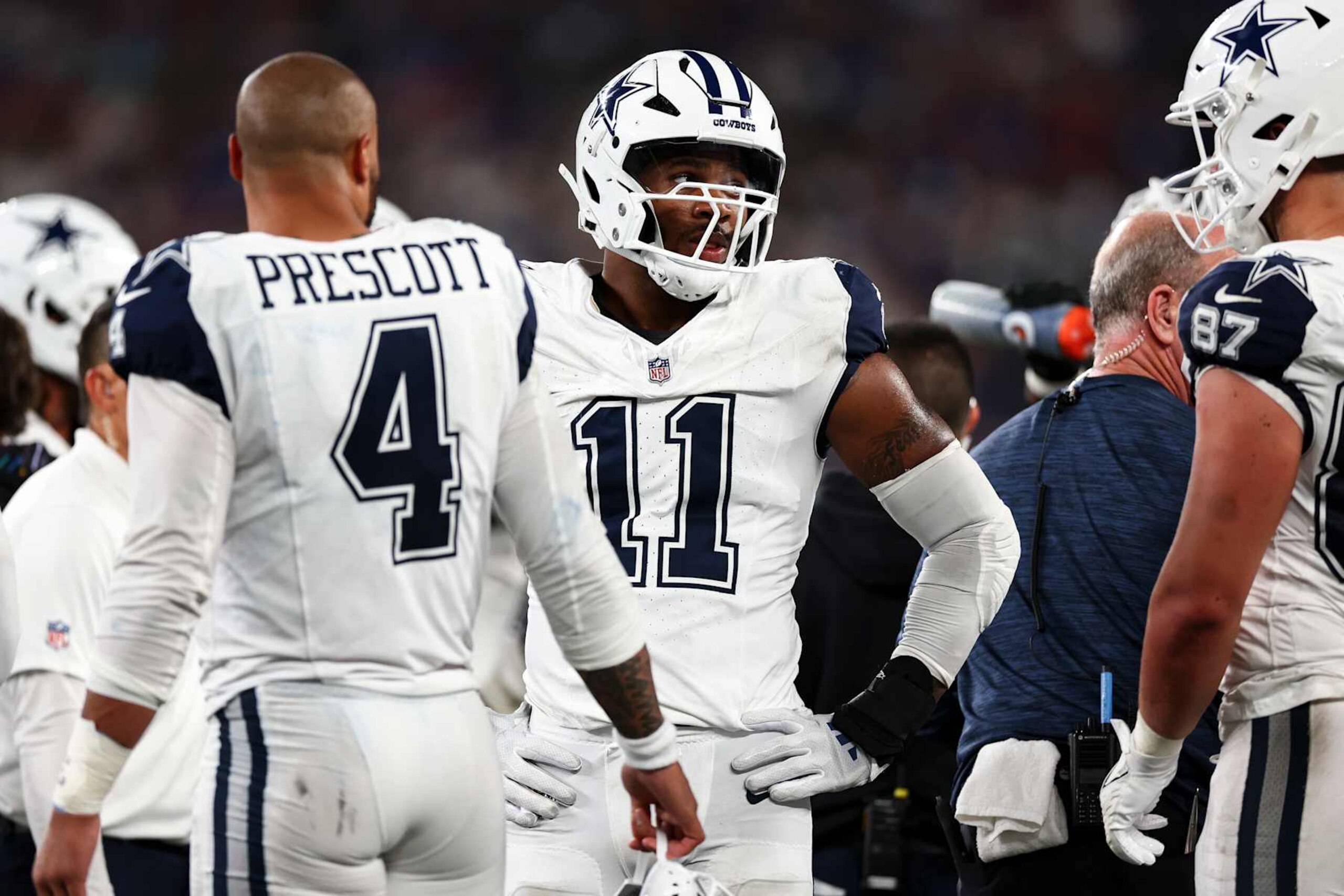 EAST RUTHERFORD, NJ - SEPTEMBER 26: Micah Parsons #11 of the Dallas Cowboys stands on the sidelines during the second quarter of an NFL football game against the New York Giants at MetLife Stadium on September 26, 2024 in East Rutherford, New Jersey. (Photo by Kevin Sabitus/Getty Images)