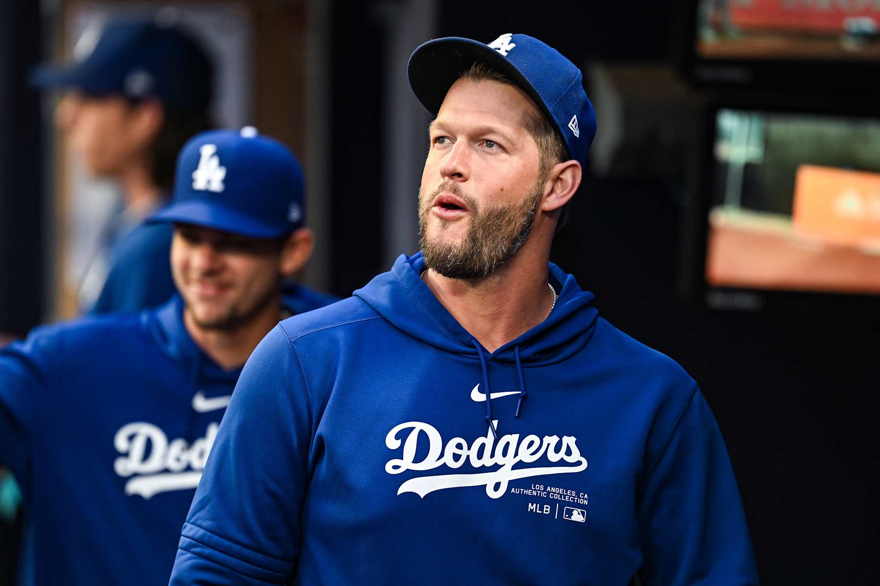 ATLANTA, GA  SEPTEMBER 13:  Injured Los Angeles pitcher Clayton Kershaw (22) in the dugout prior to the start of the MLB game between the Los Angeles Dodgers and the Atlanta Braves on September 13th, 2024 at Truist Park in Atlanta, GA. (Photo by Rich von Biberstein/Icon Sportswire via Getty Images)