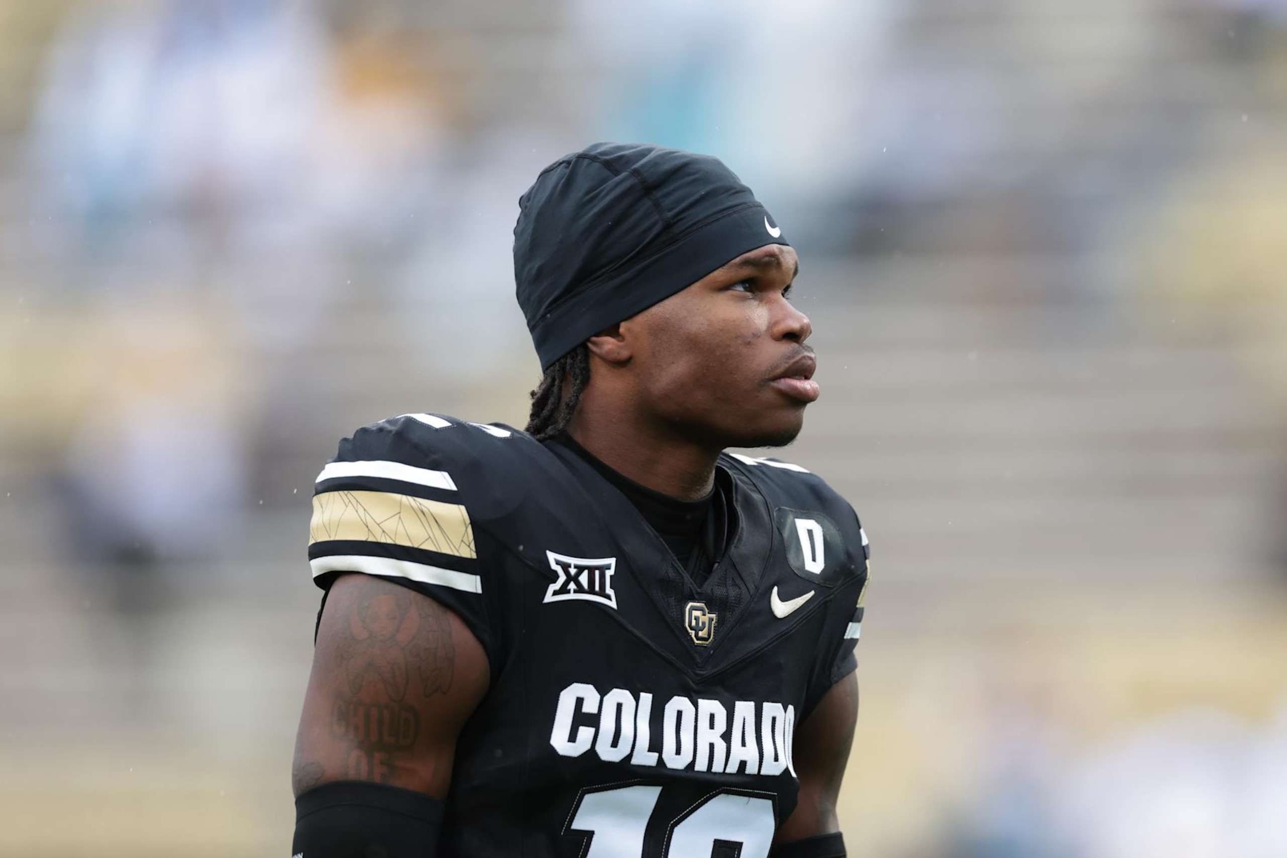 BOULDER, COLORADO - SEPTEMBER 21: Travis Hunter #12 of the Colorado Buffaloes warms up prior to the game against the Baylor Bears at Folsom Field on September 21, 2024 in Boulder, Colorado. (Photo by Andrew Wevers/Getty Images)