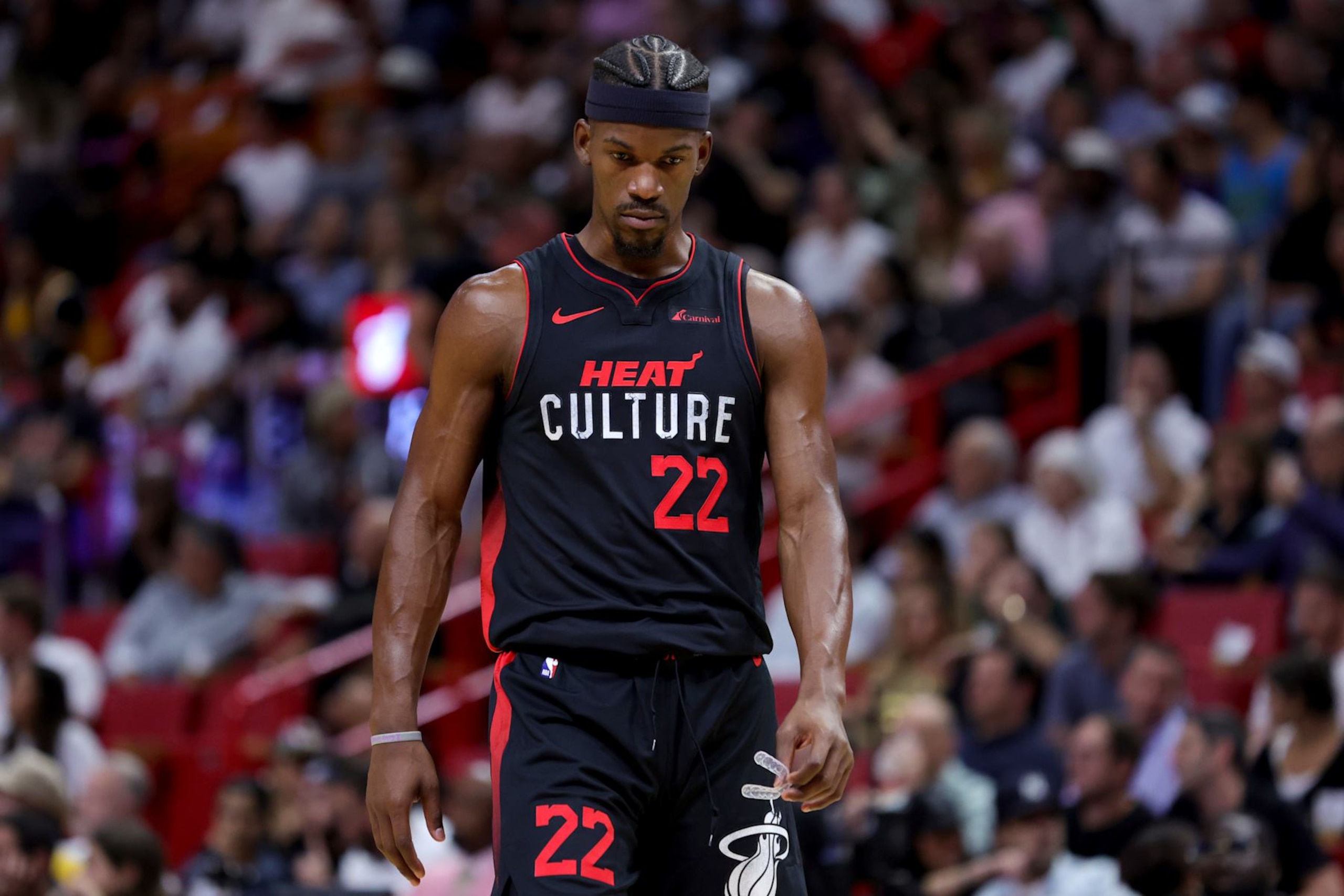 MIAMI, FLORIDA - NOVEMBER 06: Jimmy Butler #22 of the Miami Heat looks on against the Los Angeles Lakers during the first quarter at Kaseya Center on November 06, 2023 in Miami, Florida. NOTE TO USER: User expressly acknowledges and agrees that, by downloading and or using this photograph, User is consenting to the terms and conditions of the Getty Images License Agreement. (Photo by Megan Briggs/Getty Images)