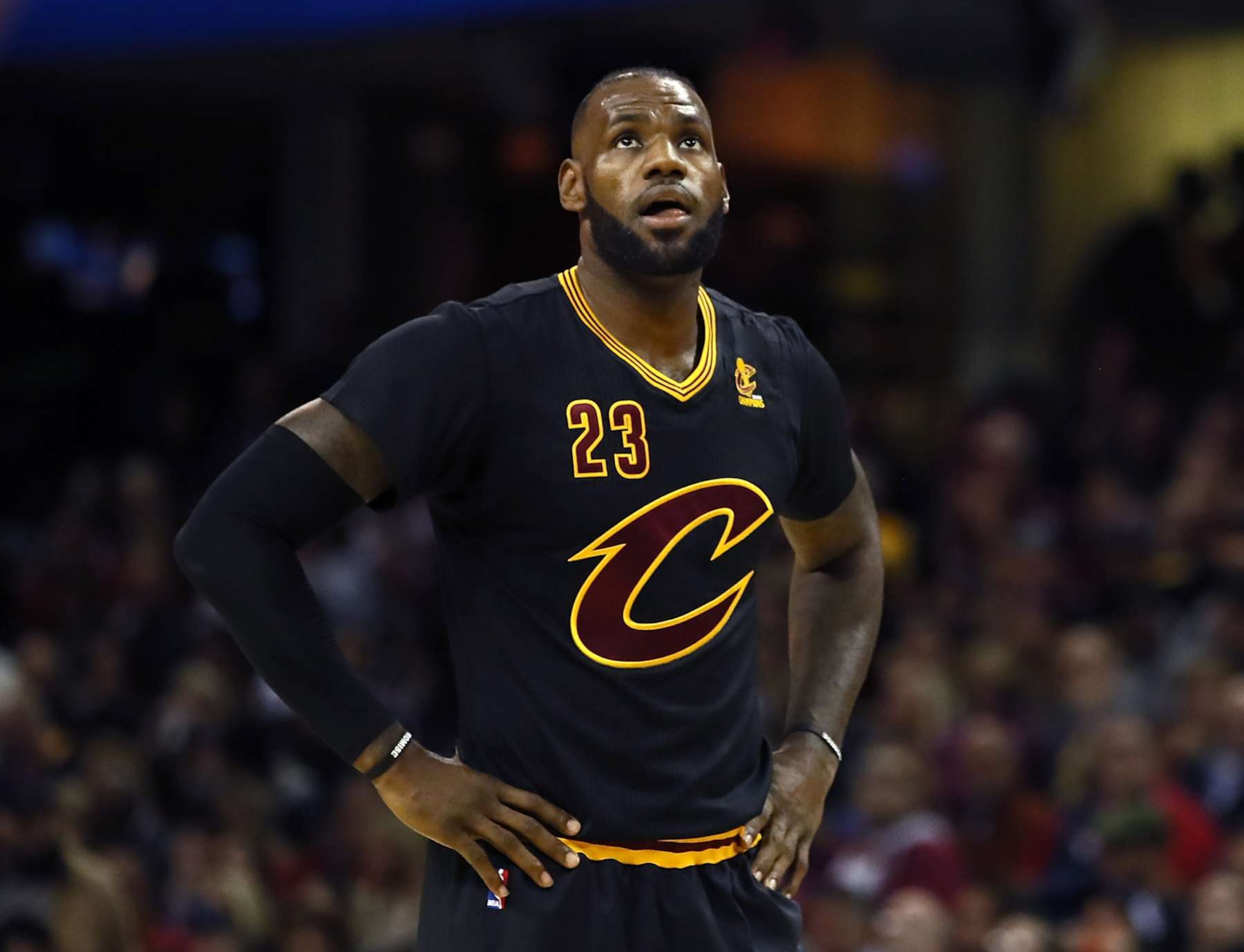CLEVELAND, OH - OCTOBER 25:  LeBron James #23 of the Cleveland Cavaliers looks on in the first quarter against the New York Knicks at Quicken Loans Arena on October 25, 2016 in Cleveland, Ohio.  NOTE TO USER: User expressly acknowledges and agrees that, by downloading and or using this photograph, User is consenting to the terms and conditions of the Getty Images License Agreement. (Photo by Ezra Shaw/Getty Images)