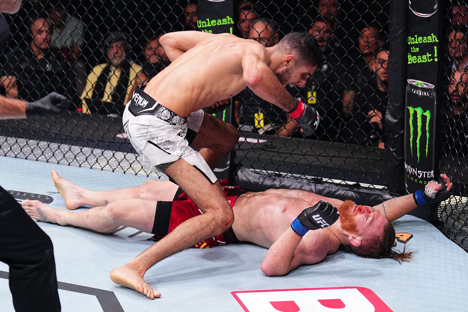 PARIS, FRANCE - SEPTEMBER 28: (L-R) Fares Ziam of France knocks out Matt Frevola in a lightweight fight during the UFC Fight Night event at The Accor Arena on September 28, 2024 in Paris, France.  (Photo by Chris Unger/Zuffa LLC)
