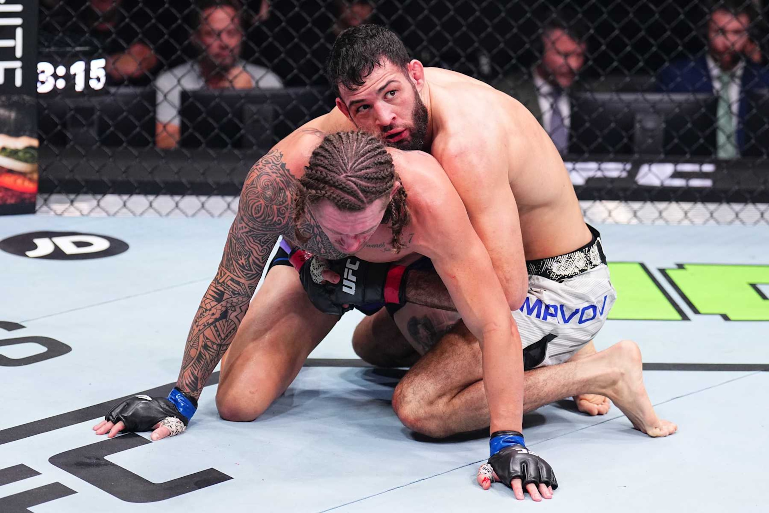 PARIS, FRANCE - SEPTEMBER 28: (R-L) Nassourdine Imavov of Russia battles Brendan Allen in a middleweight fight during the UFC Fight Night event at The Accor Arena on September 28, 2024 in Paris, France.  (Photo by Chris Unger/Zuffa LLC)