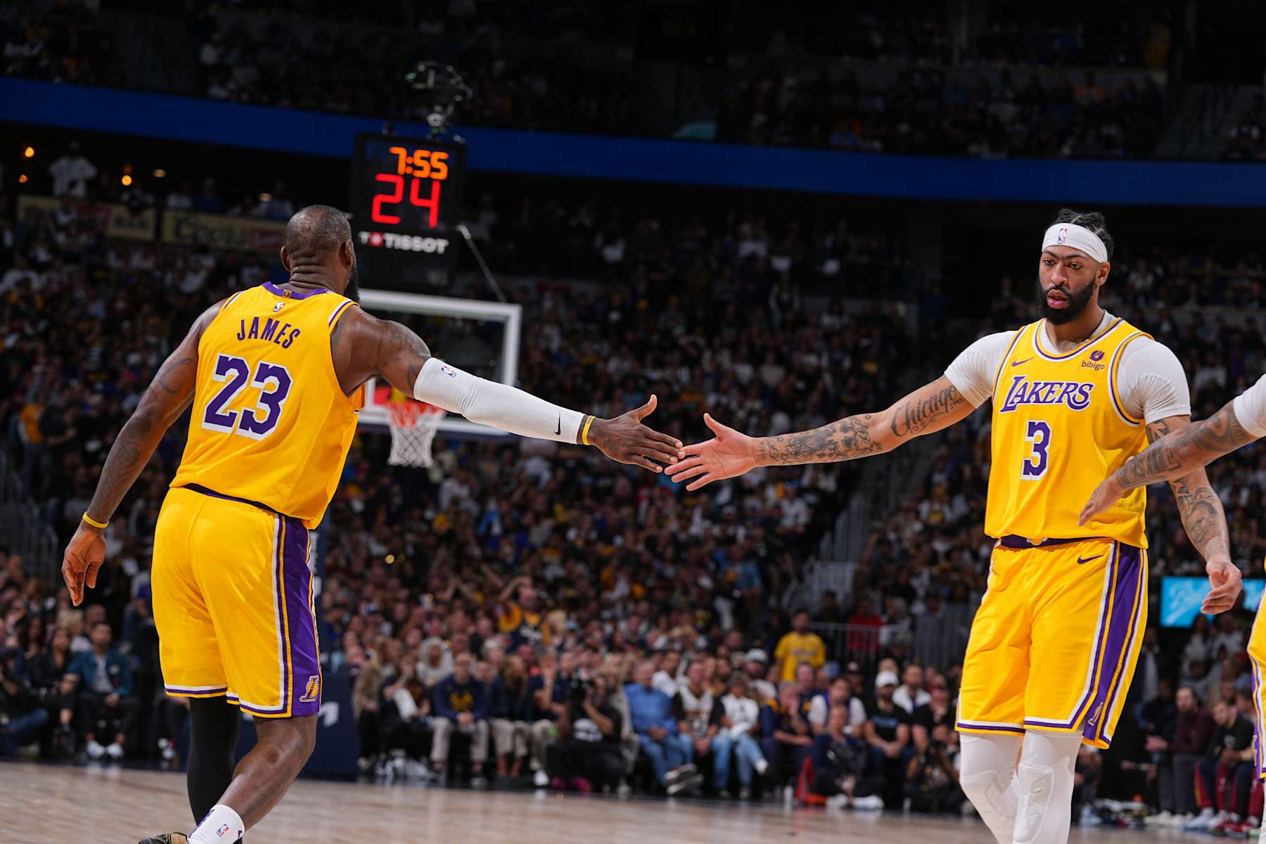 DENVER, CO - APRIL 29: LeBron James #23 of the Los Angeles Lakers and Anthony Davis #3 of the Los Angeles Lakers high five during the game against the Denver Nuggets during Round One Game Five of the 2024 NBA Playoffs on April 29, 2024 at the Ball Arena in Denver, Colorado. NOTE TO USER: User expressly acknowledges and agrees that, by downloading and/or using this Photograph, user is consenting to the terms and conditions of the Getty Images License Agreement. Mandatory Copyright Notice: Copyright 2024 NBAE (Photo by Bart Young/NBAE via Getty Images)
