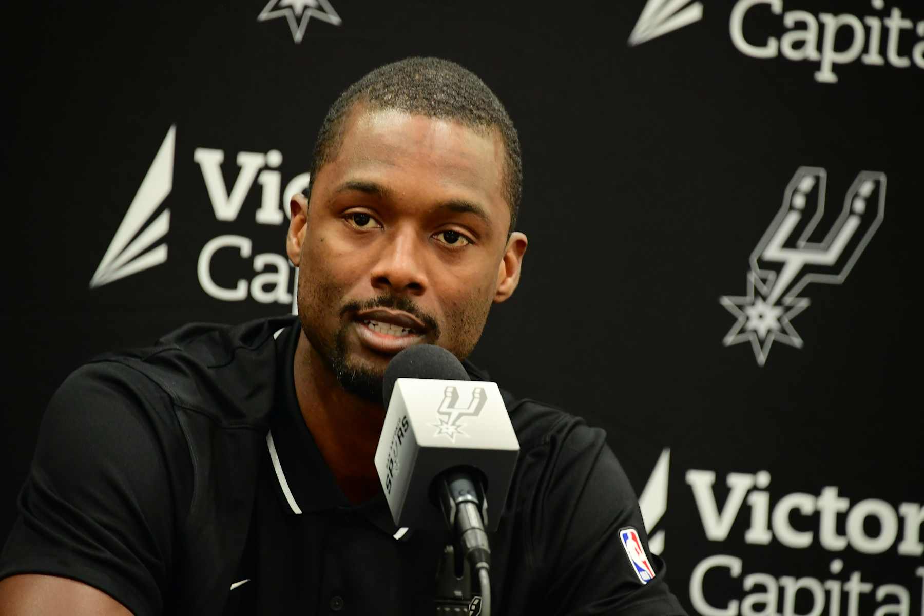 San Antonio TX, - July 9, 2024: Harrison Barnes talks to the media during the Spurs Press Conference July 9, 2024 at the Victory Capital Center in San Antonio Texas. NOTE TO USER: User expressly acknowledges and agrees that, by downloading and or using this photograph, user is consenting to the terms and conditions of the Getty Images License Agreement. Mandatory Copyright Notice: Copyright 2024 NBAE (Photos by Michael Gonzales/NBAE via Getty Images)