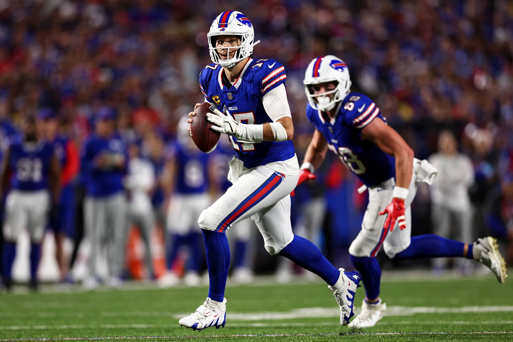 ORCHARD PARK, NY - SEPTEMBER 23: Josh Allen #17 of the Buffalo Bills carries the ball during the third quarter of an NFL football game against the Jacksonville Jaguars at Highmark Stadium on September 23, 2024 in Orchard Park, New York. (Photo by Kevin Sabitus/Getty Images)