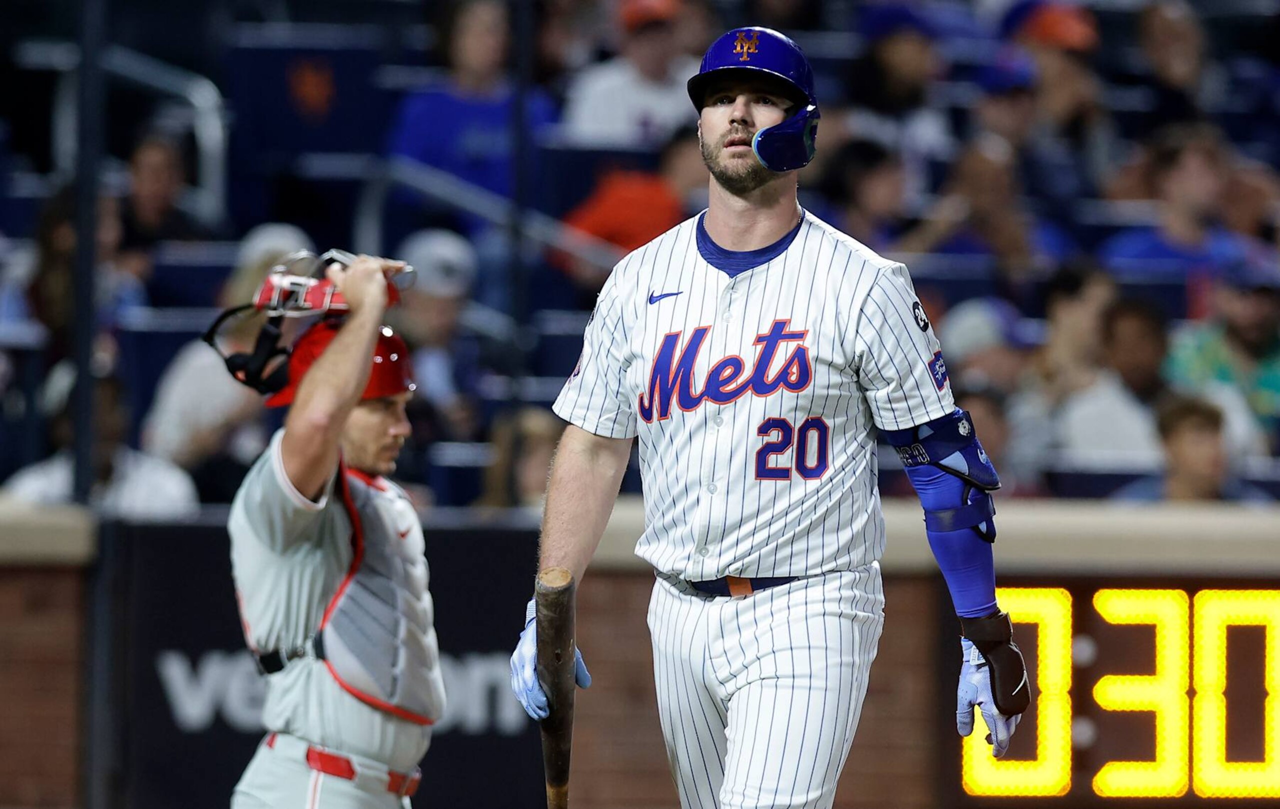 NEW YORK, NEW YORK - SEPTEMBER 22: Pete Alonso #20 of the New York Mets walks back to the dugout after striking out during the third inning against the Philadelphia Phillies at Citi Field on September 22, 2024 in New York City. (Photo by Jim McIsaac/Getty Images)