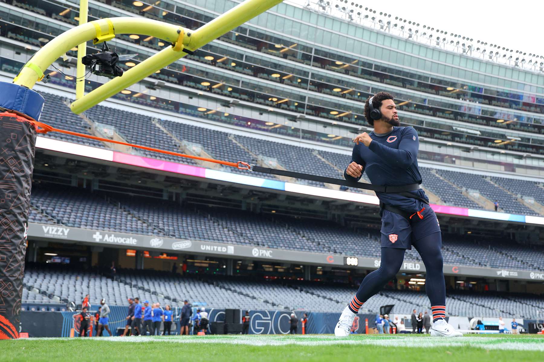 CHICAGO, ILLINOIS - SEPTEMBER 29: Caleb Williams #18 of the Chicago Bears warms up before playing the Los Angeles Rams at Soldier Field on September 29, 2024 in Chicago, Illinois. (Photo by Michael Reaves/Getty Images)