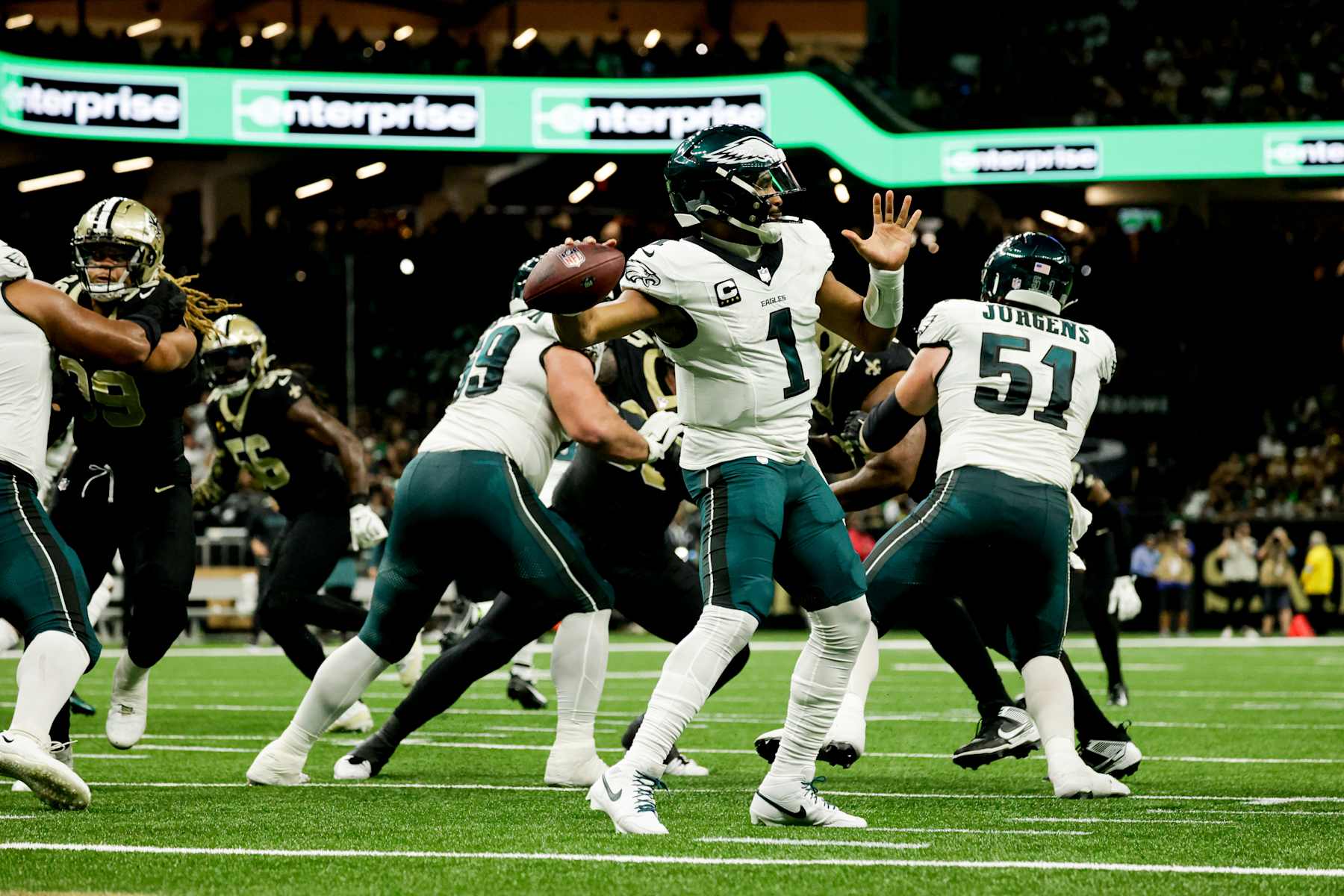 NEW  ORLEANS, LOUISIANA - SEPTEMBER 22: Jalen Hurts #1 of the Philadelphia Eagles throws against the New Orleans Saints during the first half at the Caesars Superdome on September 22, 2024 in New Orleans, Louisiana. (Photo by Derick E. Hingle/Getty Images)