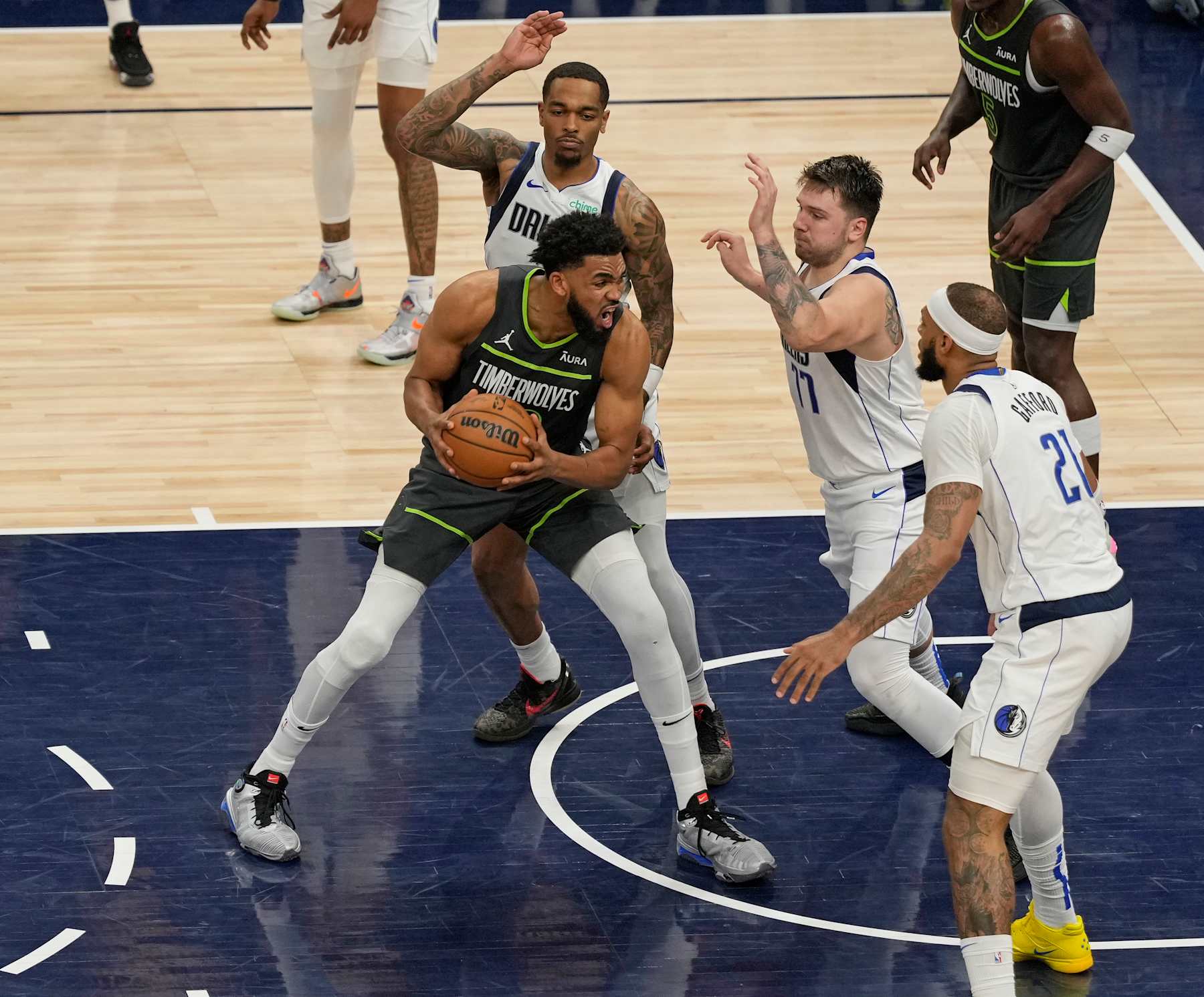 MINNEAPOLIS, MN - MAY 30: Karl-Anthony Towns #32 of the Minnesota Timberwolves handles the ball during the game against the Dallas Mavericks during Game 5 of the Western Conference Finals of the 2024 NBA Playoffs on May 30, 2024 at Target Center in Minneapolis, Minnesota. NOTE TO USER: User expressly acknowledges and agrees that, by downloading and or using this Photograph, user is consenting to the terms and conditions of the Getty Images License Agreement. Mandatory Copyright Notice: Copyright 2024 NBAE (Photo by Jordan Johnson/NBAE via Getty Images)