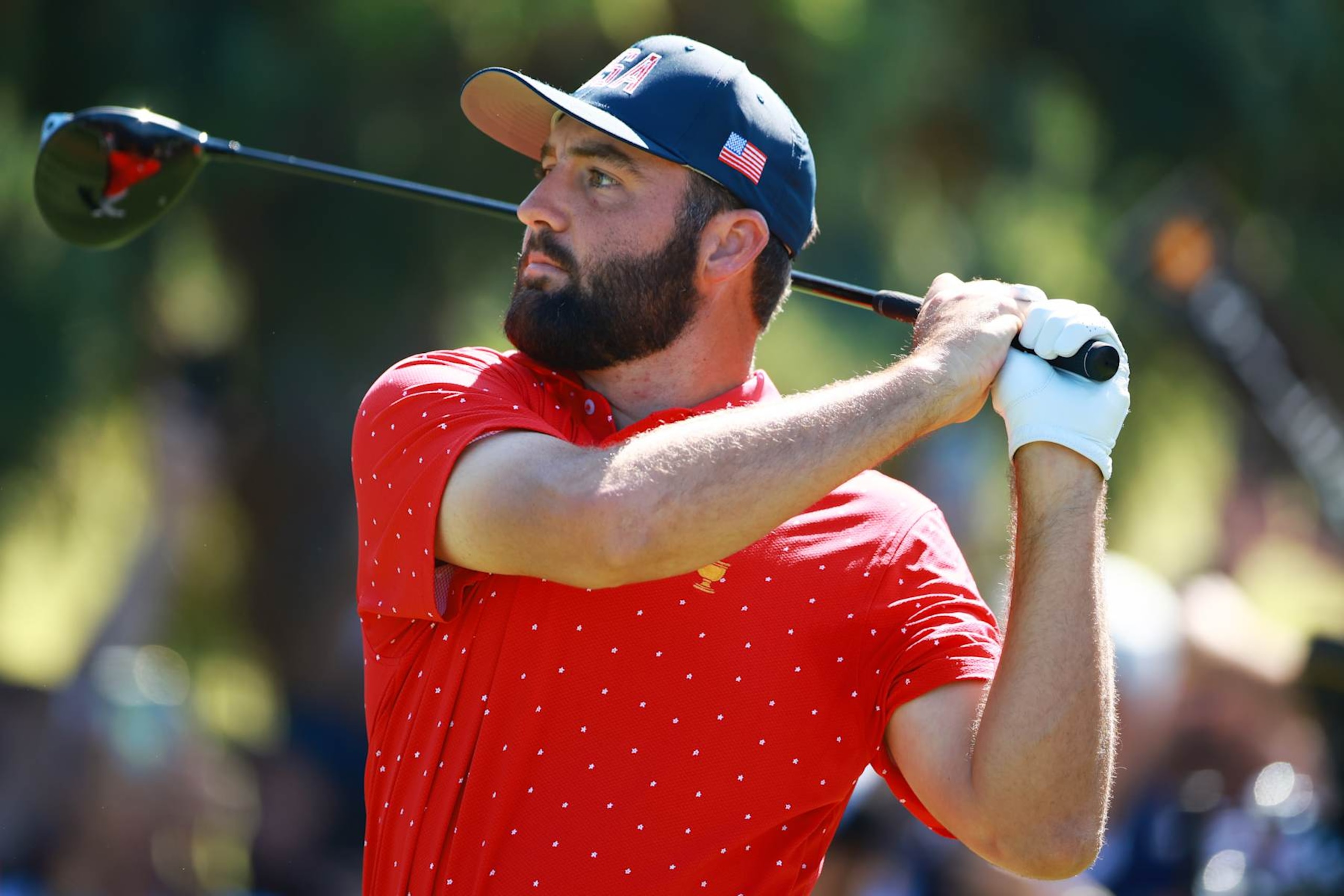 MONTREAL, QUEBEC - SEPTEMBER 29: Scottie Scheffler of the U.S. Team plays his shot from the third tee during Sunday Singles on day four of the 2024 Presidents Cup at The Royal Montreal Golf Club on September 29, 2024 in Montreal, Quebec, Canada. (Photo by Vaughn Ridley/Getty Images)