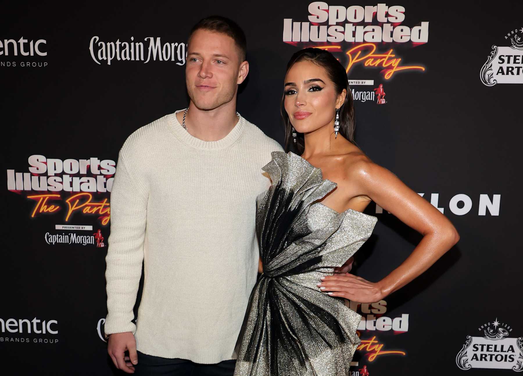 SCOTTSDALE, ARIZONA - FEBRUARY 11: (L-R) Christian McCaffrey and Olivia Culpo attend the 2023 Sports Illustrated Super Bowl Party at Talking Stick Resort on February 11, 2023 in Scottsdale, Arizona. (Photo by Ethan Miller/Getty Images)