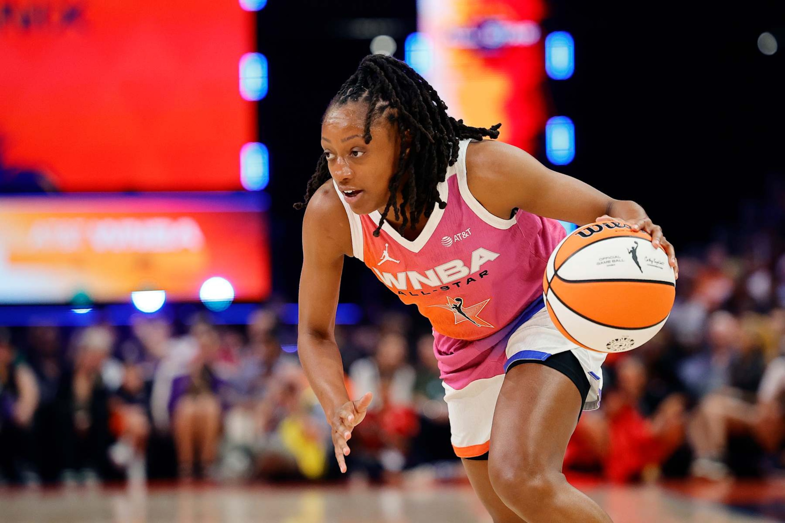 PHOENIX, ARIZONA - JULY 20: Kelsey Mitchell #0 of Team WNBA drives against the USA Basketball Women's National Team during the first half of the 2024 WNBA All-Star game at Footprint Center on July 20, 2024 in Phoenix, Arizona. NOTE TO USER: User expressly acknowledges and agrees that, by downloading and or using this photograph, User is consenting to the terms and conditions of the Getty Images License Agreement. (Photo by Alex Slitz/Getty Images)