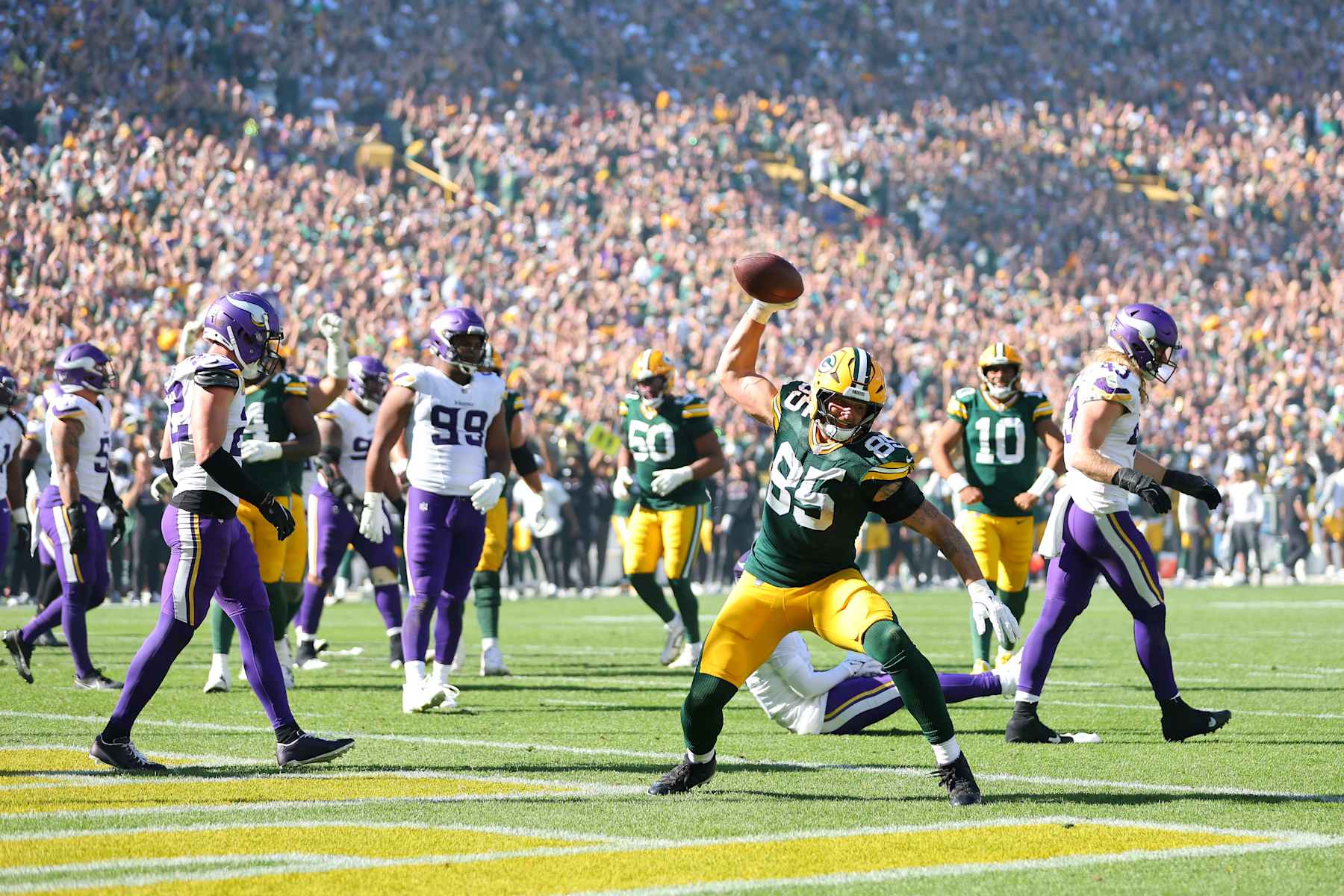 GREEN BAY, WISCONSIN - SEPTEMBER 29: Tucker Kraft #85 of the Green Bay Packers celebrates after scoring a touchdown against the Minnesota Vikings during the fourth quarter of the game at Lambeau Field on September 29, 2024 in Green Bay, Wisconsin. (Photo by Stacy Revere/Getty Images)