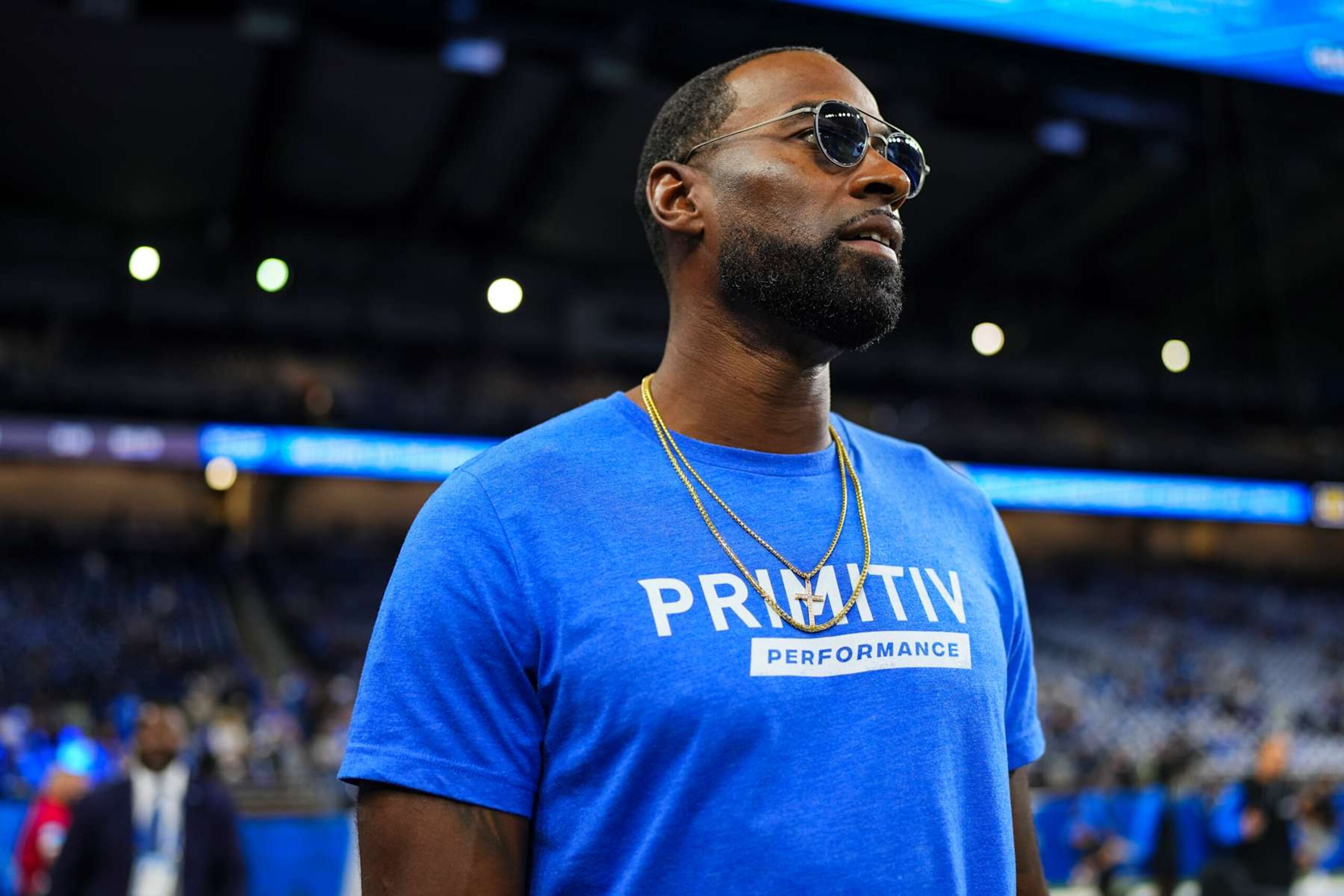 DETROIT, MI - SEPTEMBER 08: Calvin Johnson Jr looks on from the sideline prior to an NFL football game between the Los Angeles Rams and the Detroit Lions at Ford Field on September 8, 2024 in Detroit, Michigan. (Photo by Cooper Neill/Getty Images) DETROIT, MI - SEPTEMBER 08: Calvin Johnson Jr looks on from the sideline prior to an NFL football game between the Los Angeles Rams and the Detroit Lions at Ford Field on September 8, 2024 in Detroit, Michigan. (Photo by Cooper Neill/Getty Images)