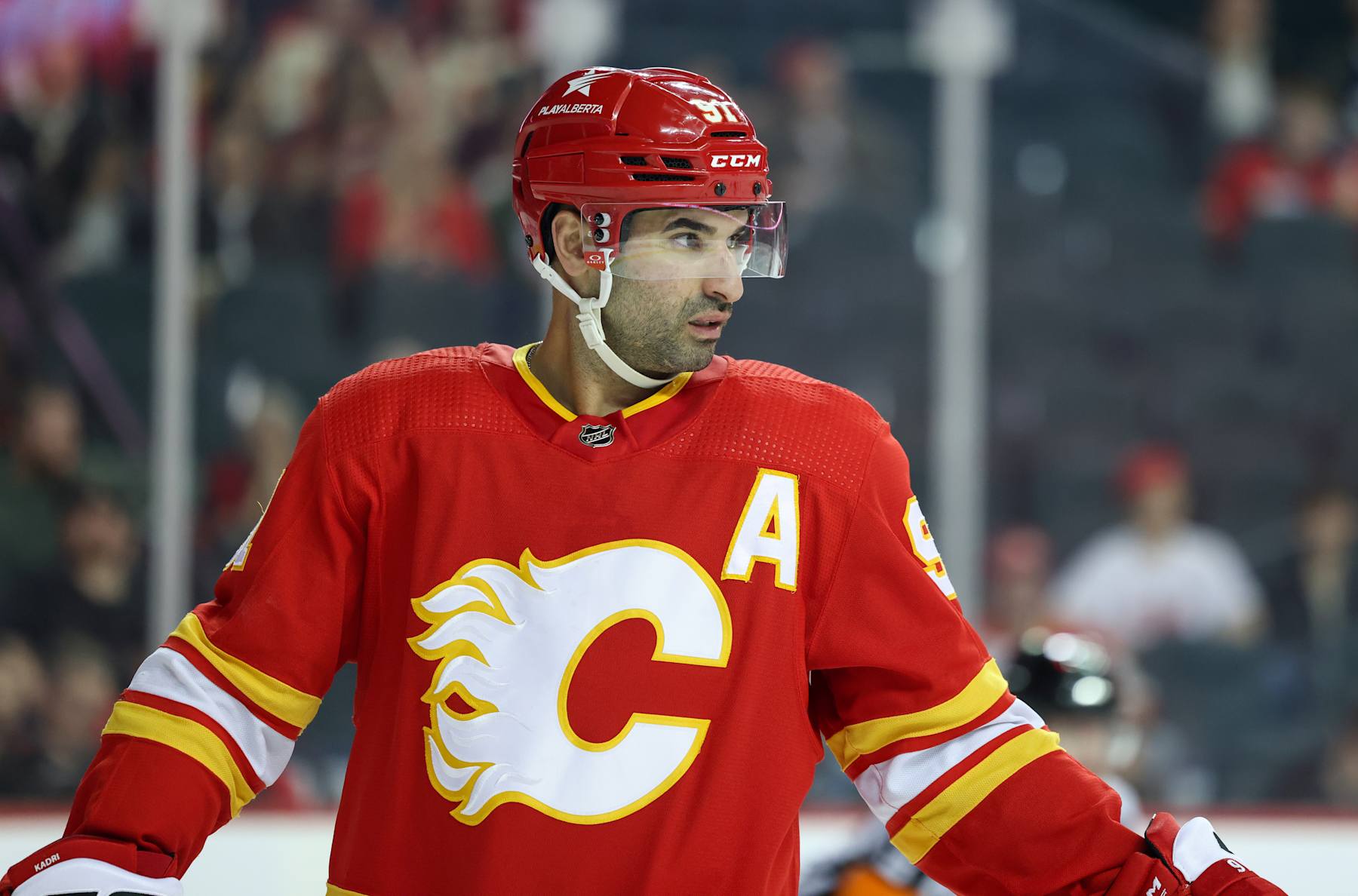 CALGARY, CANADA - APRIL 14: Nazem Kadri #91 of the Calgary Flames skates during a break in play against the Arizona Coyotes at the Scotiabank Saddledome on April 14, 2024, in Calgary, Alberta, Canada. (Photo by Leah Hennel/Getty Images)