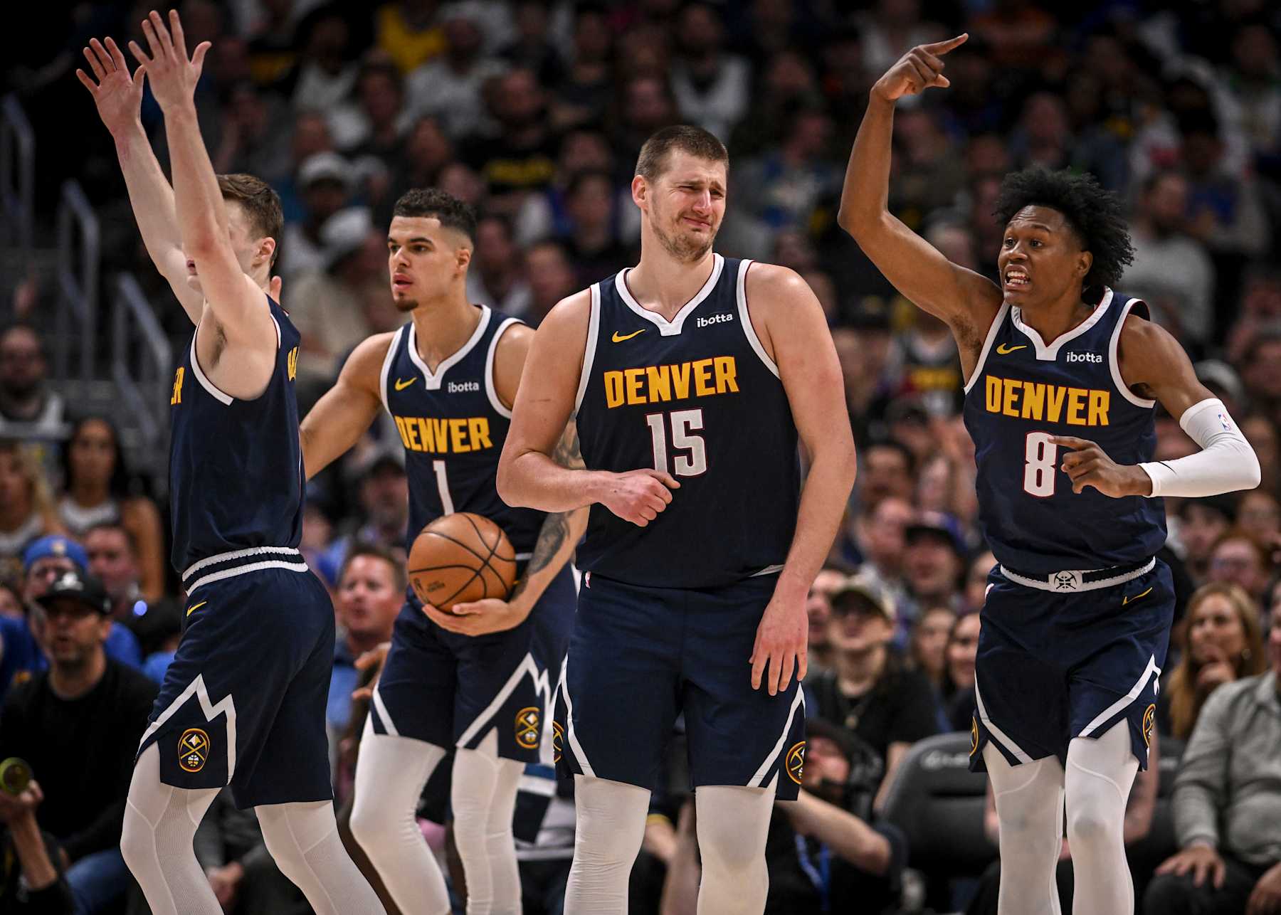 DENVER, CO - APRIL 10: Christian Braun (0), Michael Porter Jr. (1), Nikola Jokic (15) and Peyton Watson (8) of the Denver Nuggets contest a call in unison during the fourth quarter of the Nuggets' 116-107 win over the Minnesota Timberwolves at Ball Arena in Denver on Wednesday, April 10, 2024. (Photo by AAron Ontiveroz/The Denver Post)