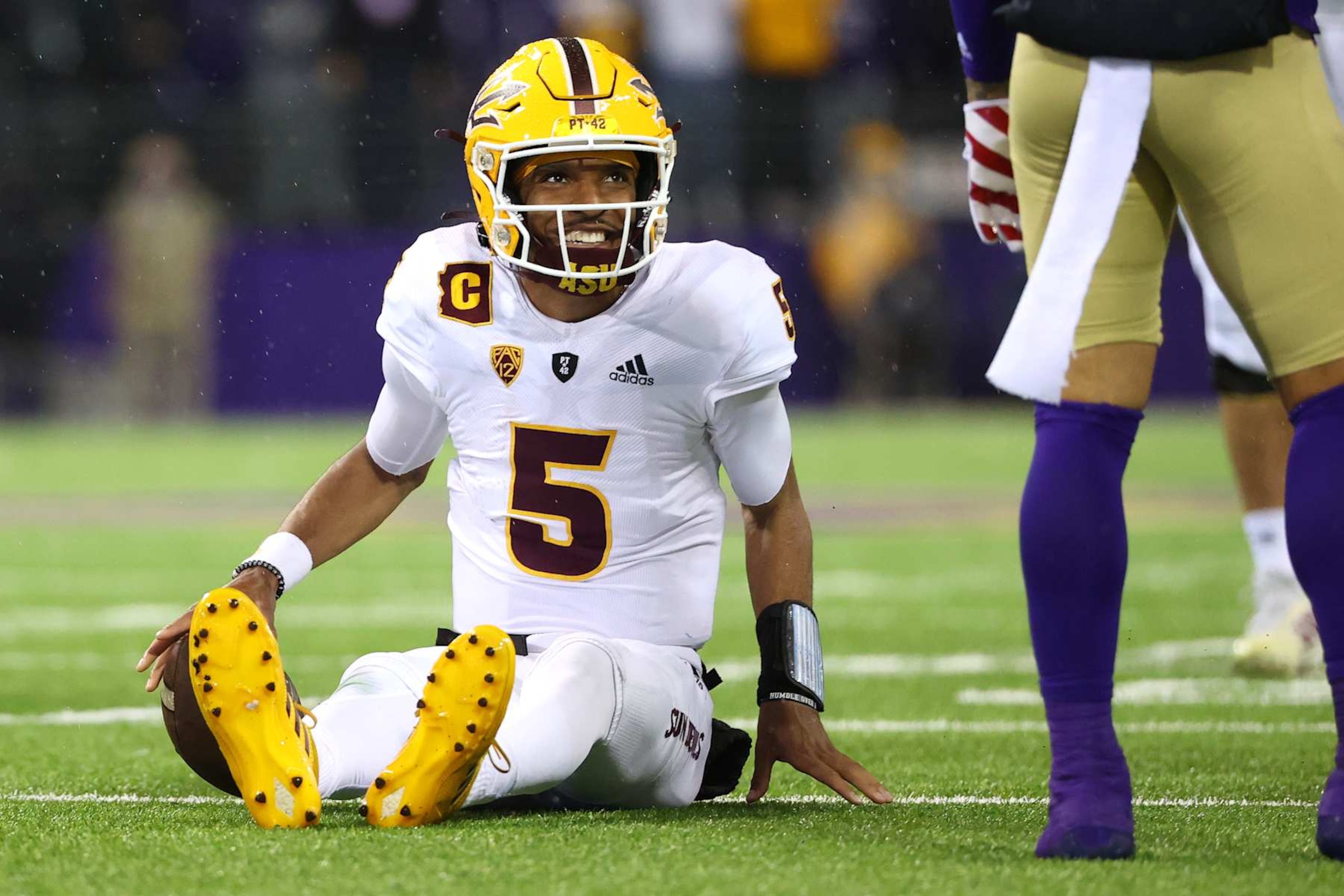 SEATTLE, WASHINGTON - NOVEMBER 13: Jayden Daniels #5 of the Arizona State Sun Devils reacts against the Washington Huskies during the second quarter at Husky Stadium on November 13, 2021 in Seattle, Washington. (Photo by Abbie Parr/Getty Images)