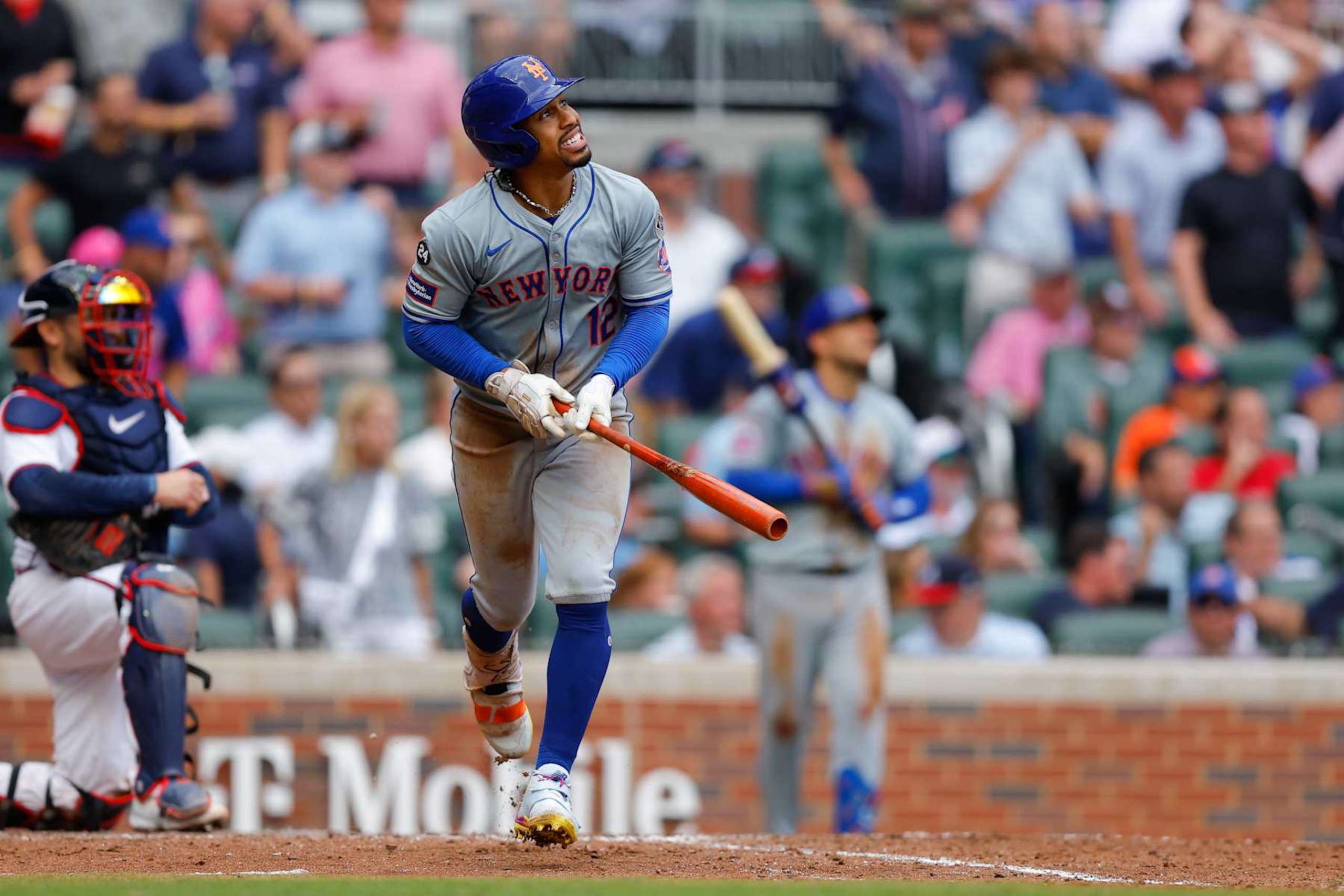 ATLANTA, GA - SEPTEMBER 30: Francisco Lindor #12 of the New York Mets reacts as he runs to first base after hitting a two-run home run in the ninth inning during the game between the New York Mets and the Atlanta Braves at Truist Park on Monday, September 30, 2024 in Atlanta, Georgia. (Photo by Todd Kirkland/MLB Photos via Getty Images)
