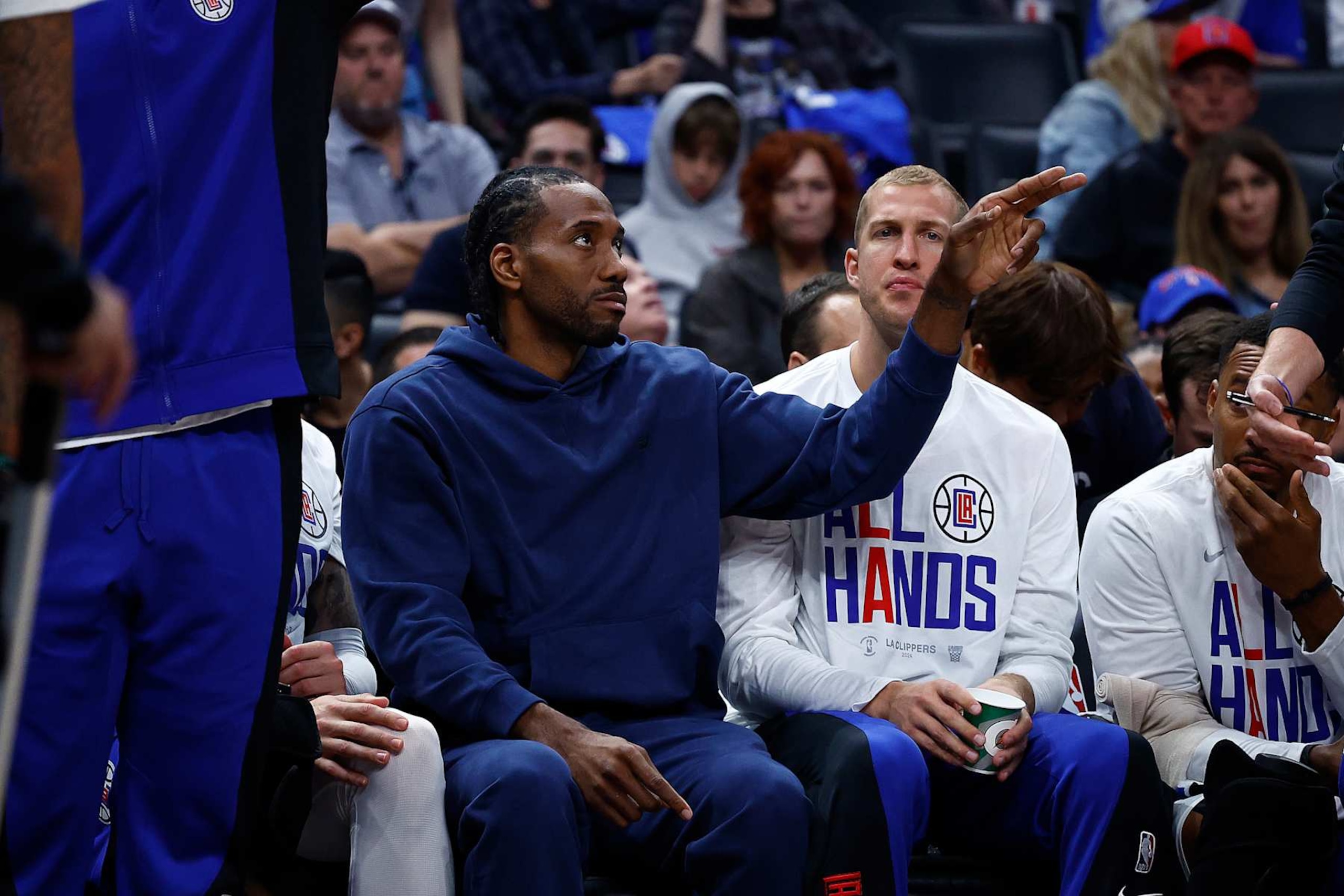 LOS ANGELES, CALIFORNIA - APRIL 21:  Kawhi Leonard #2 of the LA Clippers on the bench against the Dallas Mavericks in the second half during game one of the Western Conference First Round Playoffs at Crypto.com Arena on April 21, 2024 in Los Angeles, California.   NOTE TO USER: User expressly acknowledges and agrees that, by downloading and/or using this photograph, user is consenting to the terms and conditions of the Getty Images License Agreement.  (Photo by Ronald Martinez/Getty Images)