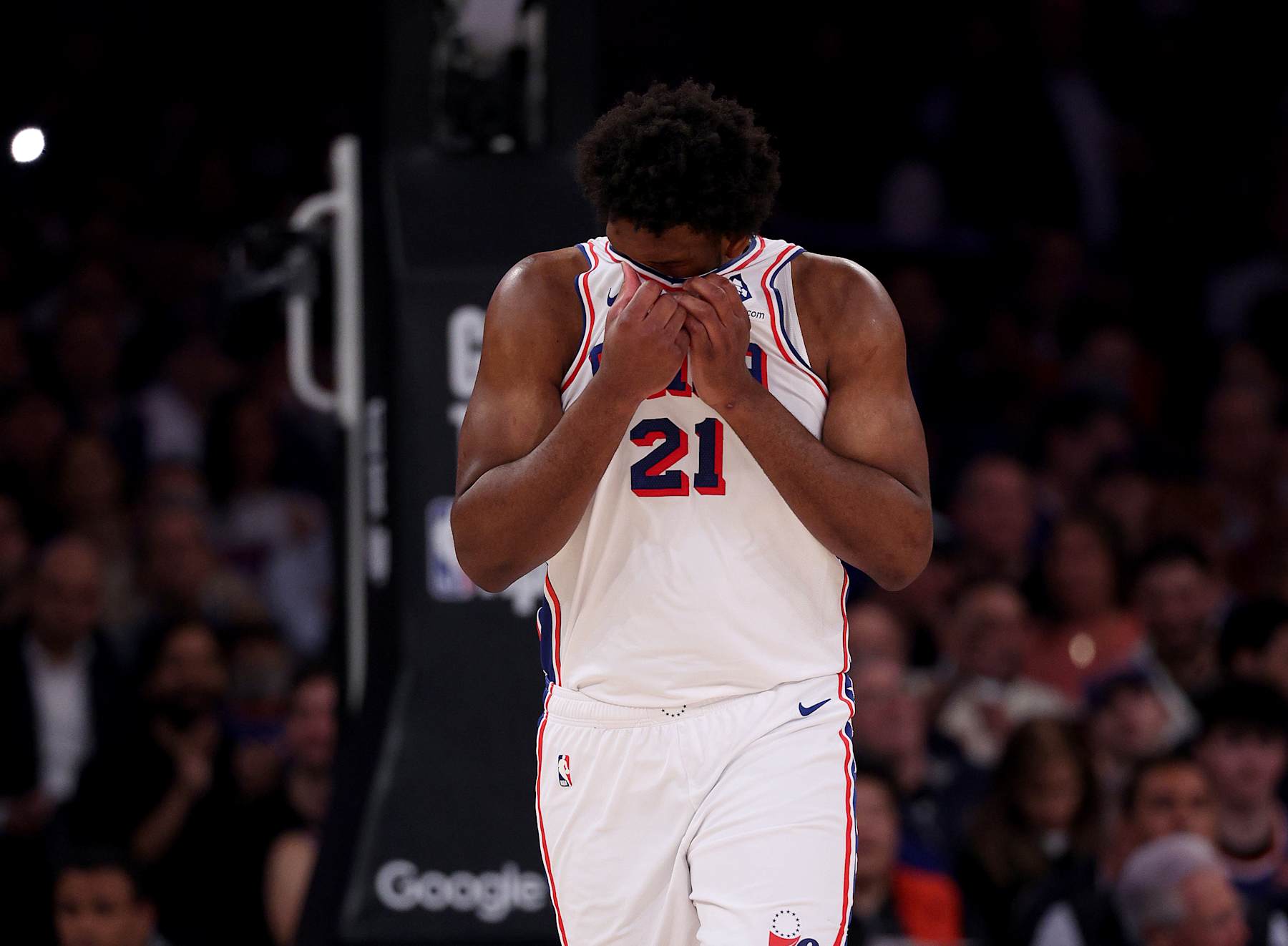 NEW YORK, NEW YORK - APRIL 30: Joel Embiid #21 of the Philadelphia 76ers reacts during the first half against the New York Knicks at Madison Square Garden on April 30, 2024 in New York City. NOTE TO USER: User expressly acknowledges and agrees that, by downloading and or using this photograph, User is consenting to the terms and conditions of the Getty Images License Agreement. (Photo by Elsa/Getty Images)