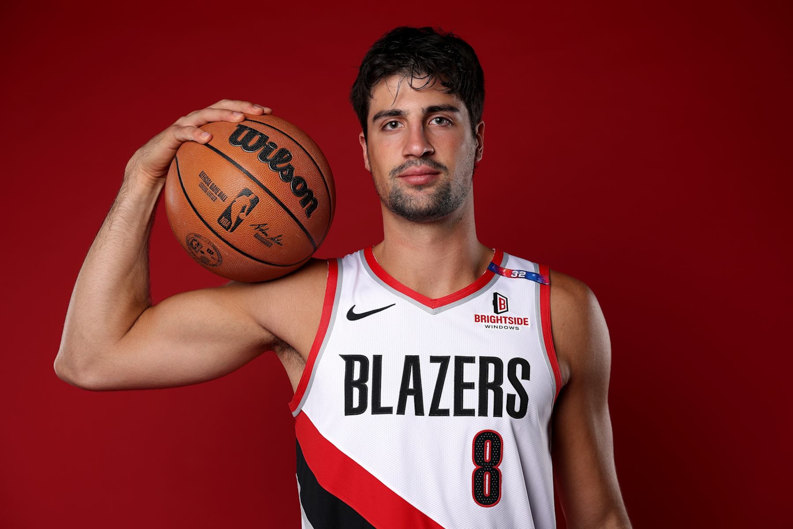 PORTLAND, OREGON - SEPTEMBER 30: Deni Avdija #8 of the Portland Trail Blazers poses for a portrait during Blazers Media Day at Veterans Memorial Coliseum on September 30, 2024 in Portland, Oregon. NOTE TO USER: User expressly acknowledges and agrees that, by downloading and/or using this photograph, user is consenting to the terms and conditions of the Getty Images License Agreement. (Photo by Steph Chambers/Getty Images)