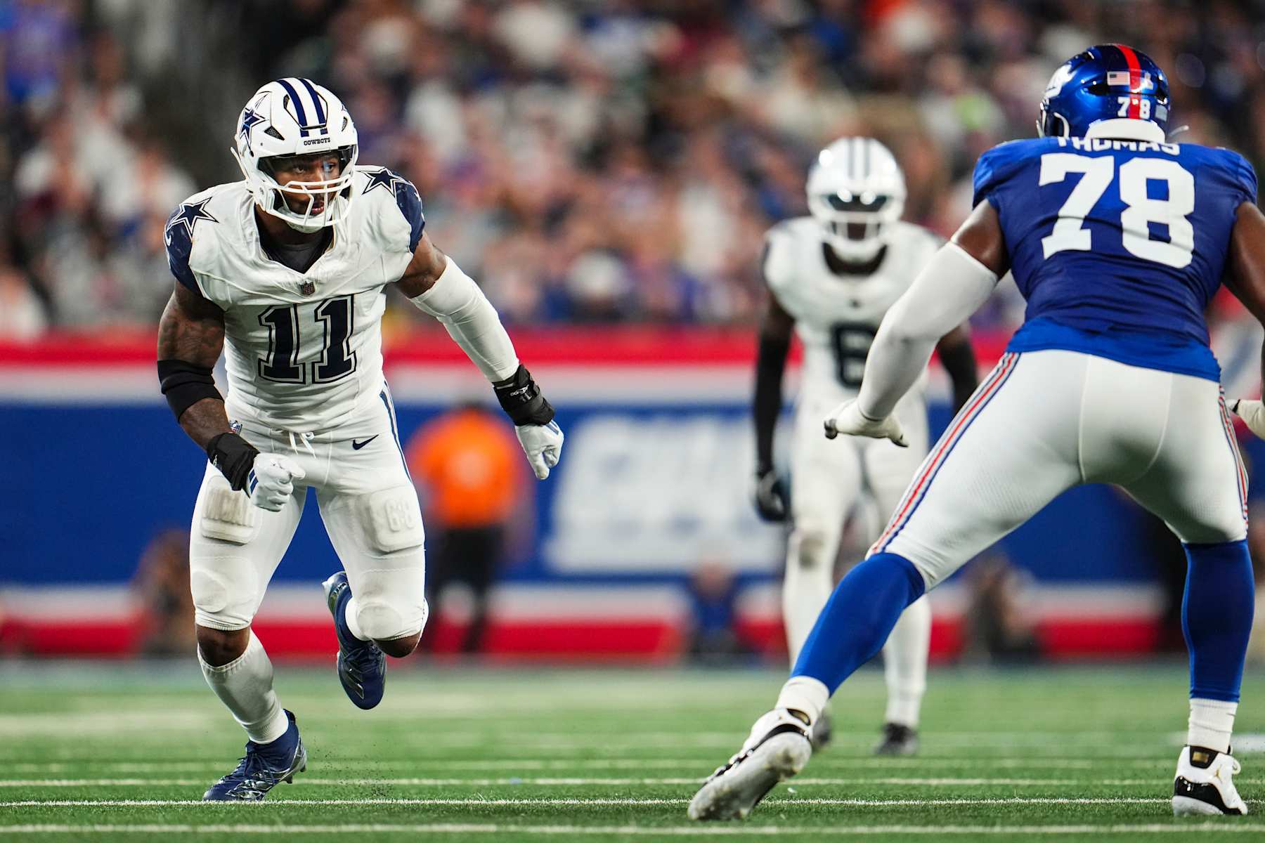 EAST RUTHERFORD, NJ - SEPTEMBER 26: Micah Parsons #11 of the Dallas Cowboys rushes the passer during an NFL football game against the New York Giants at MetLife Stadium on September 26, 2024 in East Rutherford, New Jersey. (Photo by Cooper Neill/Getty Images)