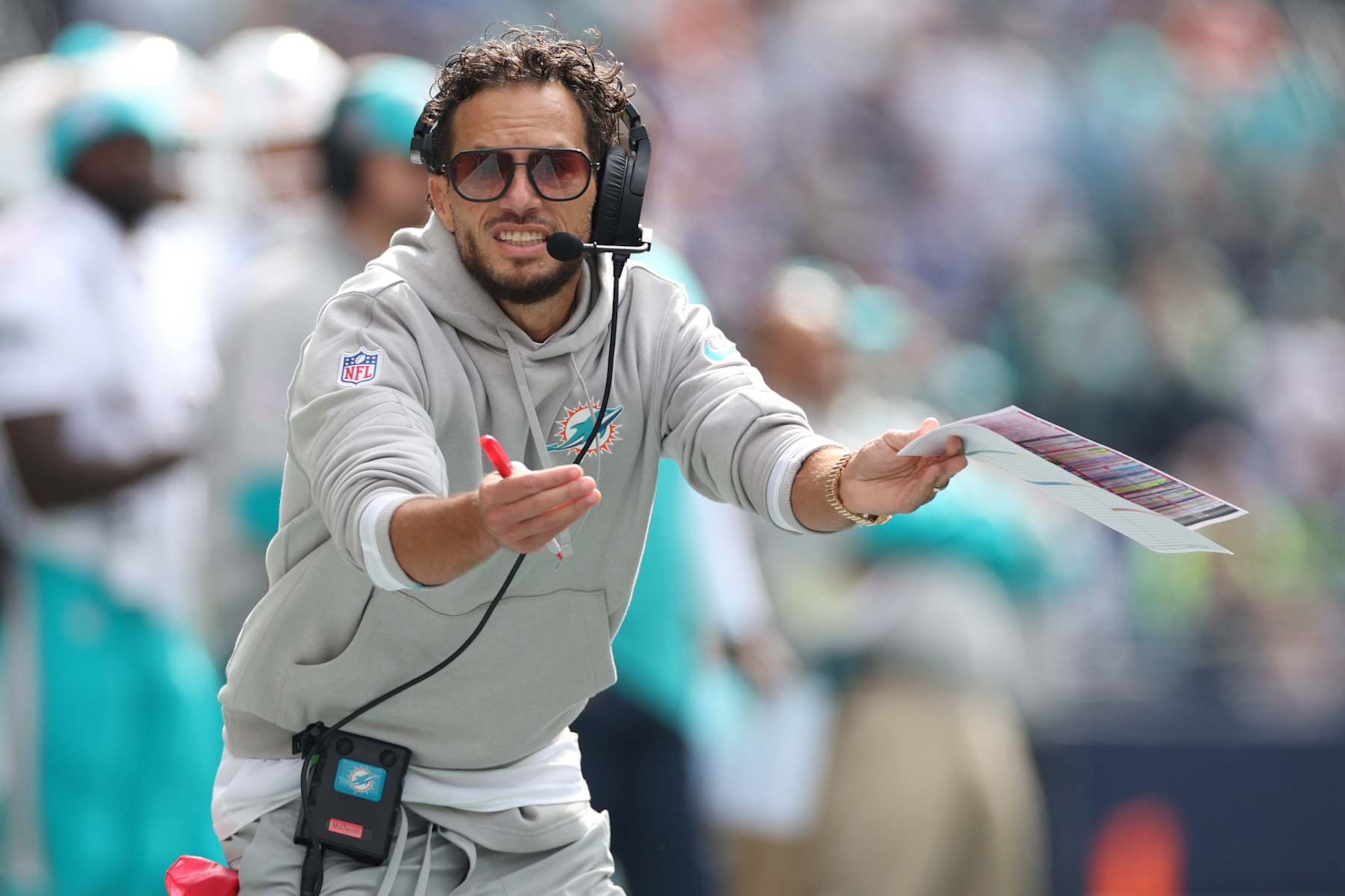 SEATTLE, WASHINGTON - SEPTEMBER 22: Head coach Mike McDaniel of the Miami Dolphins calls a timeout during the first quarter against the Seattle Seahawks at Lumen Field on September 22, 2024 in Seattle, Washington. (Photo by Steph Chambers/Getty Images)