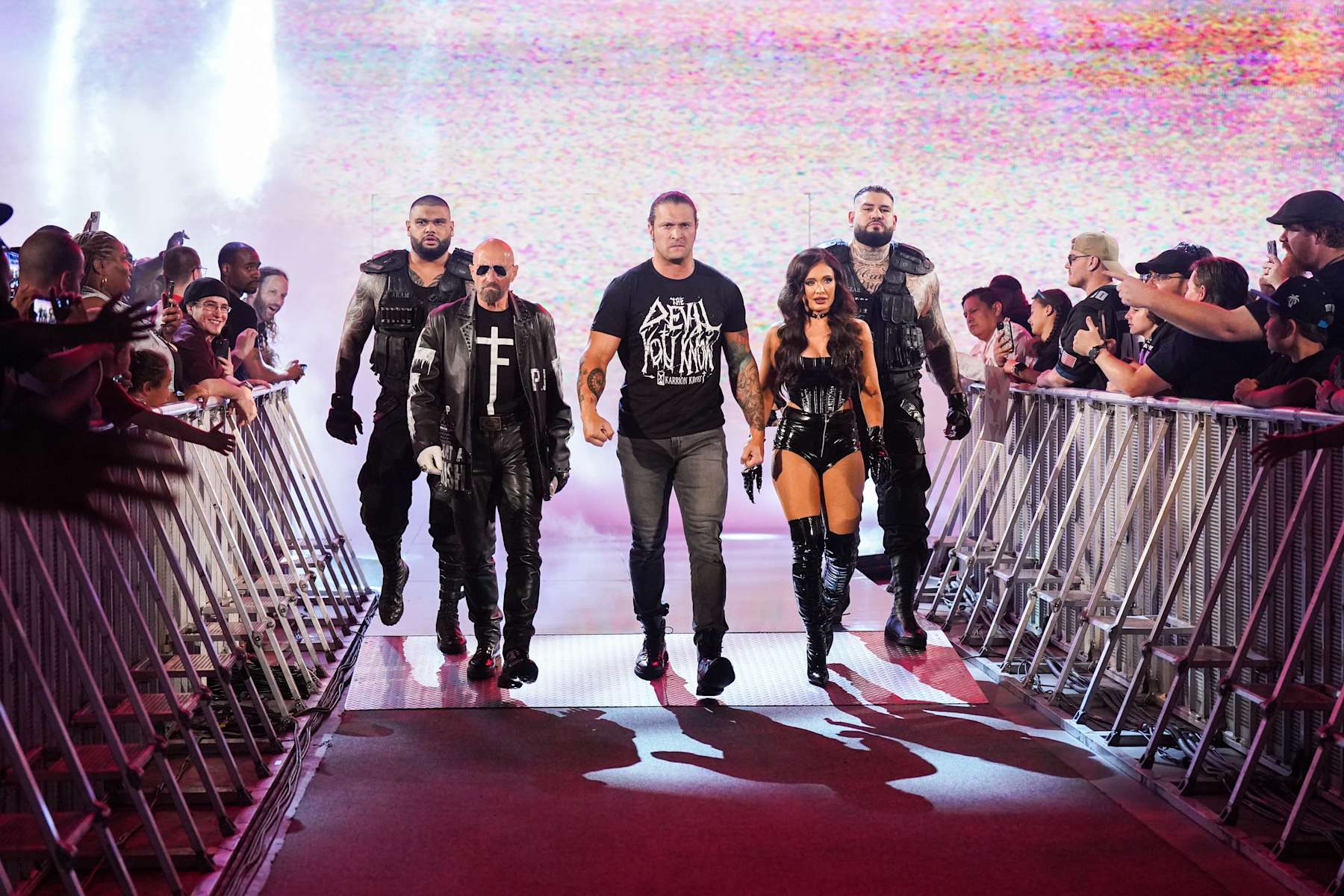 BALTIMORE, MARYLAND - AUGUST 5: Akam, Paul Ellering, Karrion Kross, Scarlett, and Rezar of The Final Testament make their way to the ring during Monday Night RAW at CFG Bank Arena on August 5, 2024 in Baltimore, Maryland.  (Photo by WWE/Getty Images)