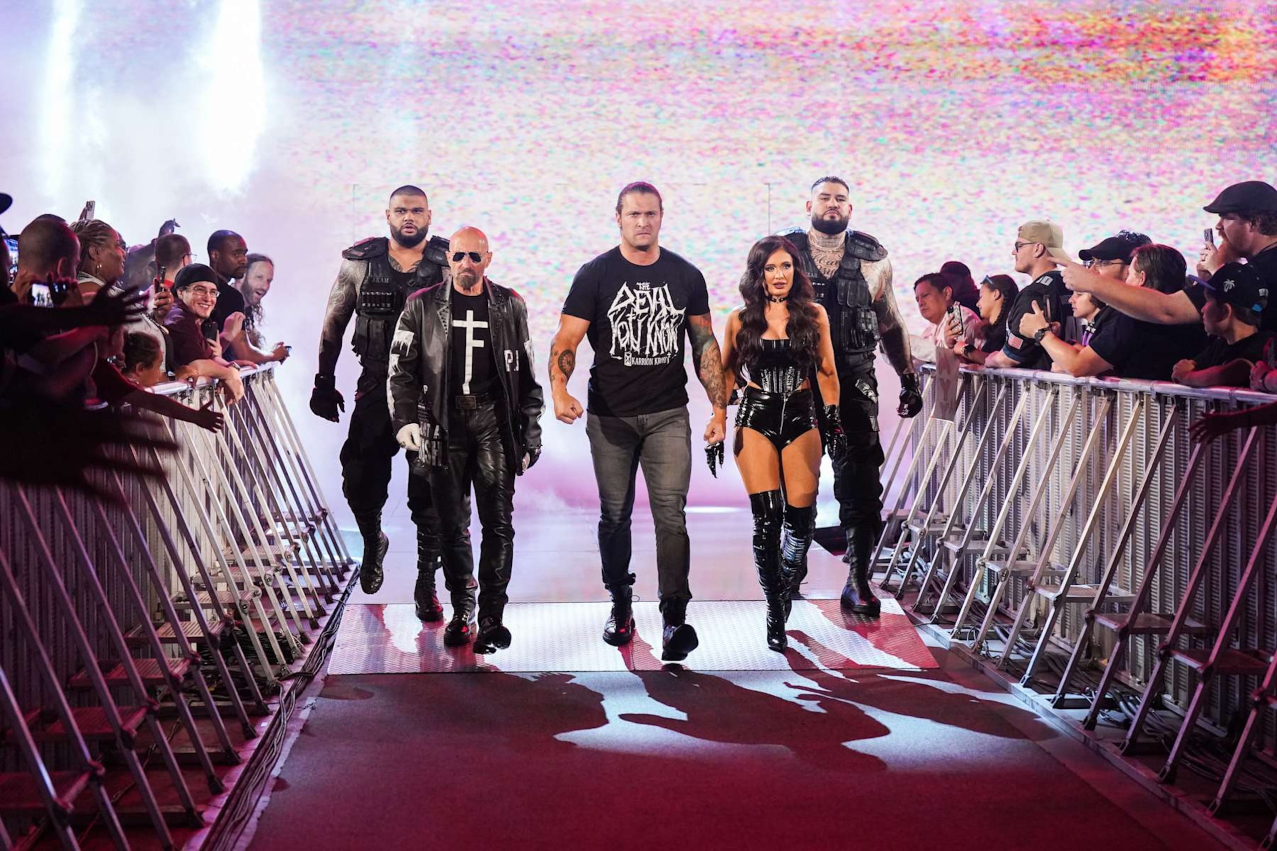 BALTIMORE, MARYLAND - AUGUST 5: Akam, Paul Ellering, Karrion Kross, Scarlett, and Rezar of The Final Testament make their way to the ring during Monday Night RAW at CFG Bank Arena on August 5, 2024 in Baltimore, Maryland.  (Photo by WWE/Getty Images)