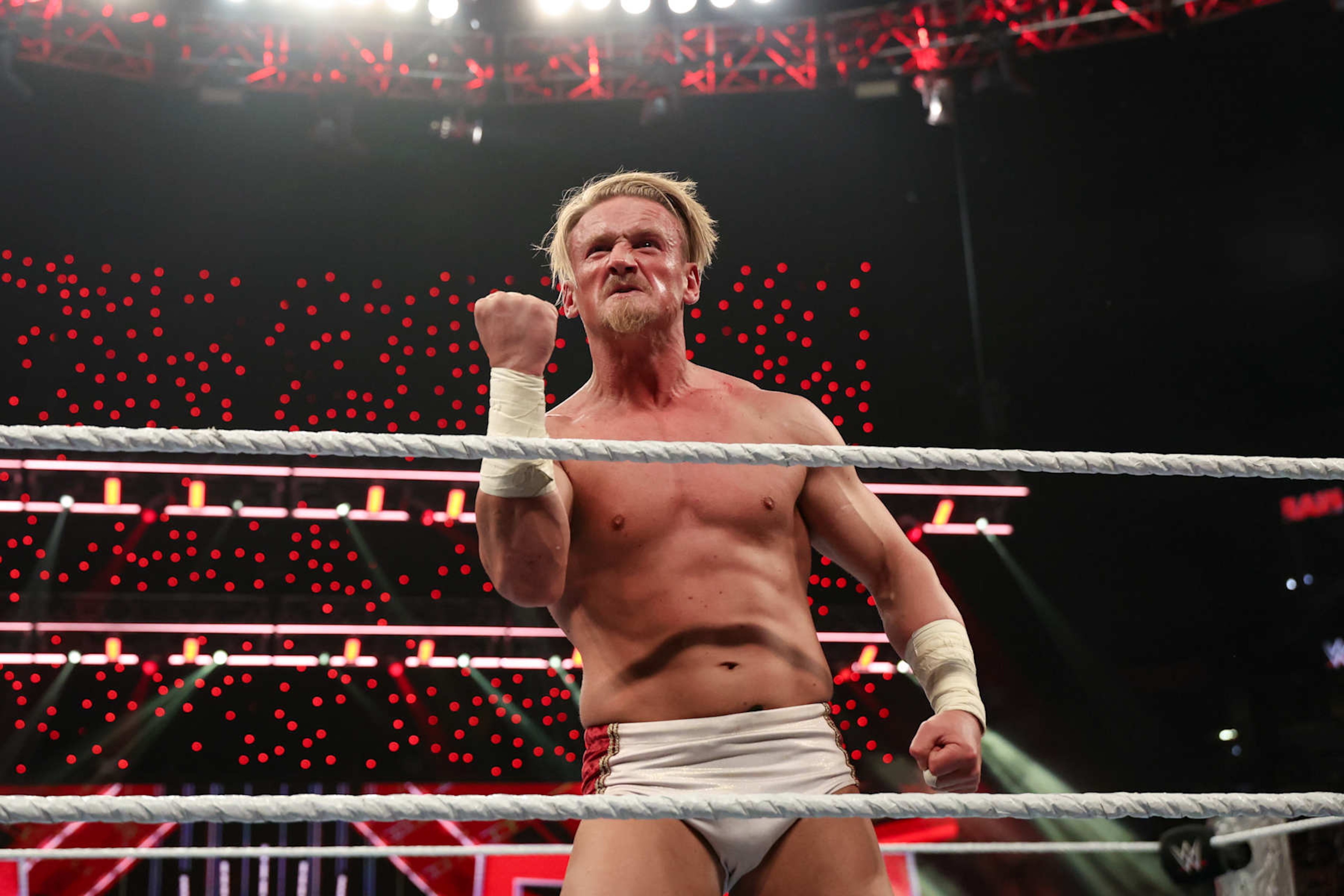 DENVER, COLORADO - SEPTEMBER 2: Ilja Dragunov celebrates during Monday Night RAW at Ball Arena on September 2, 2024 in Denver, Colorado. (Photo by WWE/Getty Images) DENVER, COLORADO - SEPTEMBER 2: Ilja Dragunov celebrates during Monday Night RAW at Ball Arena on September 2, 2024 in Denver, Colorado. (Photo by WWE/Getty Images)