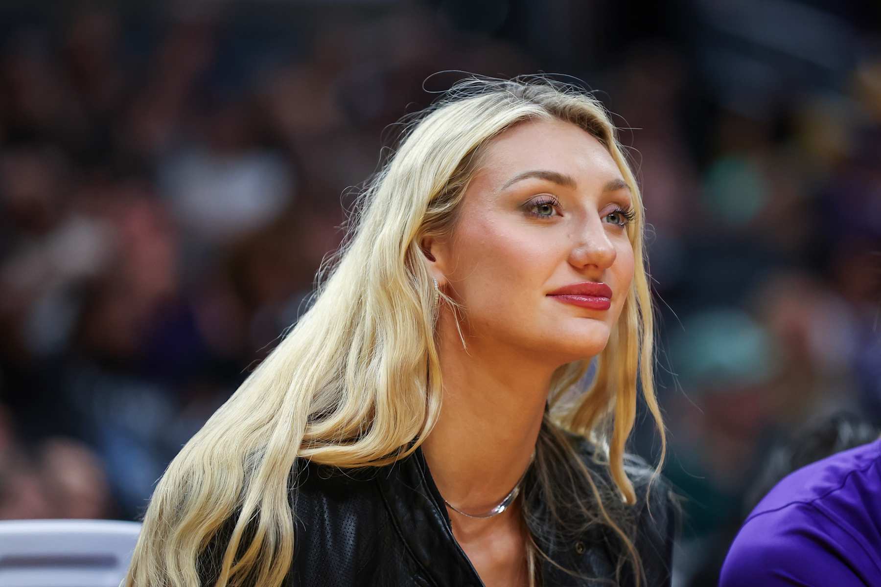 LOS ANGELES, CALIFORNIA - JULY 09: Cameron Brink #22 of the Los Angeles Sparks looks on from the bench during the second half of the game against the Minnesota Lynx at Crypto.com Arena on July 09, 2024 in Los Angeles, California. NOTE TO USER: User expressly acknowledges and agrees that, by downloading and/or using this Photograph, user is consenting to the terms and conditions of the Getty Images License Agreement. (Photo by Meg Oliphant/Getty Images)