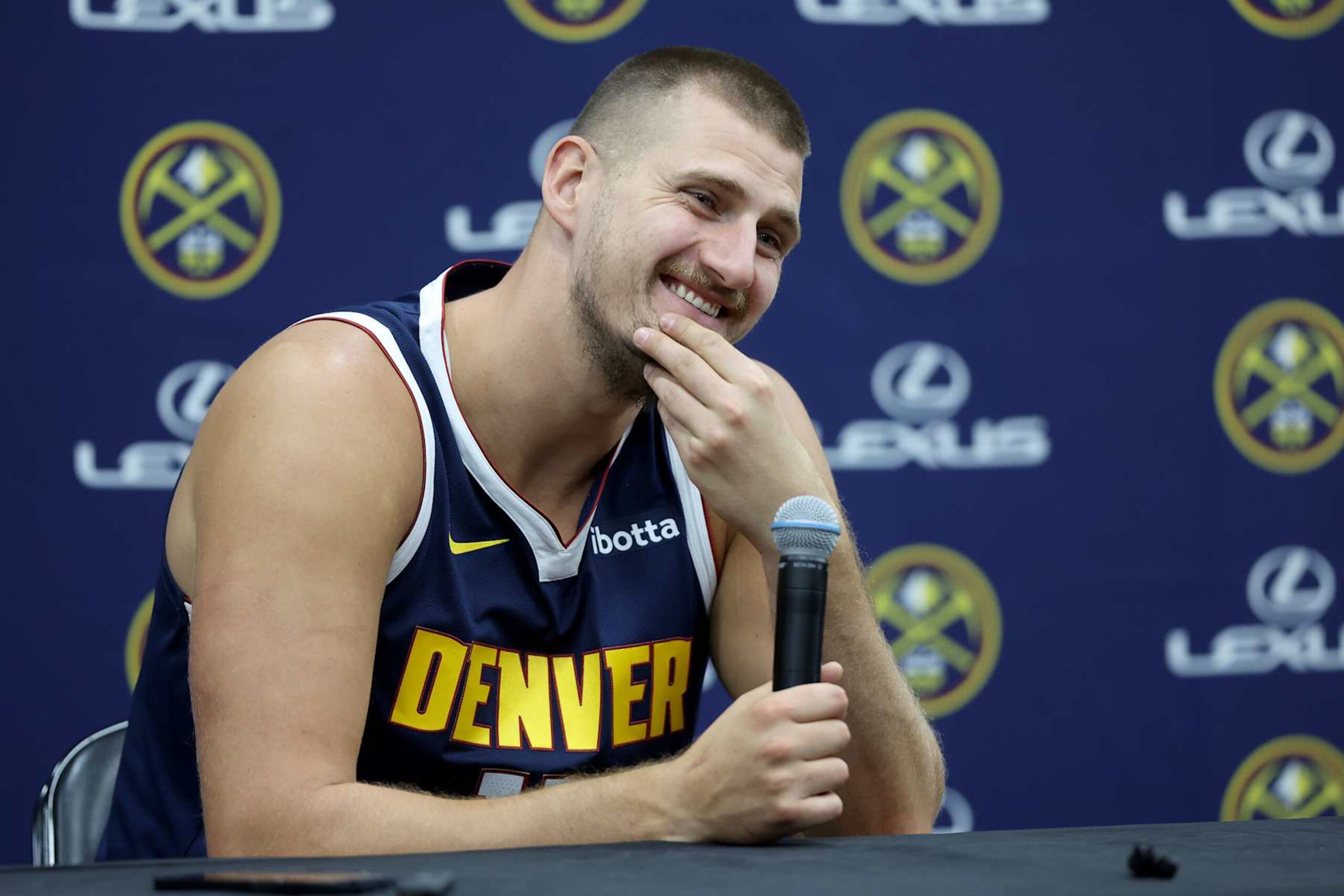 DENVER, COLORADO - SEPTEMBER 26: Nikola Jokic #15 of the Denver Nuggets fields questions during Denver Nuggets Media Day at Ball Arena on September 26, 2024 in Denver, Colorado. NOTE TO USER: User expressly acknowledges and agrees that, by downloading and or using this photograph, User is consenting to the terms and conditions of the Getty Images License Agreement. (Photo by Matthew Stockman/Getty Images)