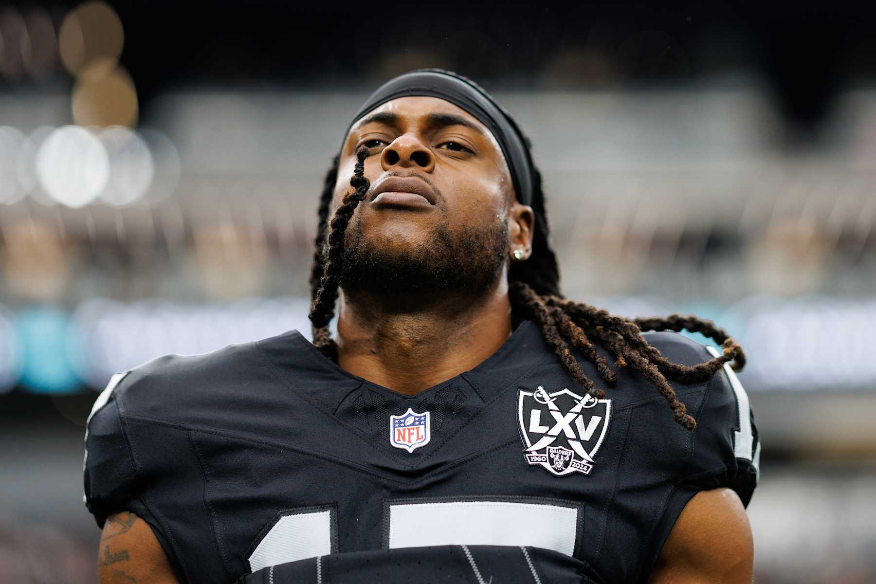 LAS VEGAS, NEVADA - SEPTEMBER 22: Wide receiver Davante Adams #17 of the Las Vegas Raiders stretches prior to an NFL football game against the Carolina Panthers, at Allegiant Stadium on September 22, 2024 in Las Vegas, Nevada. (Photo by Brooke Sutton/Getty Images)